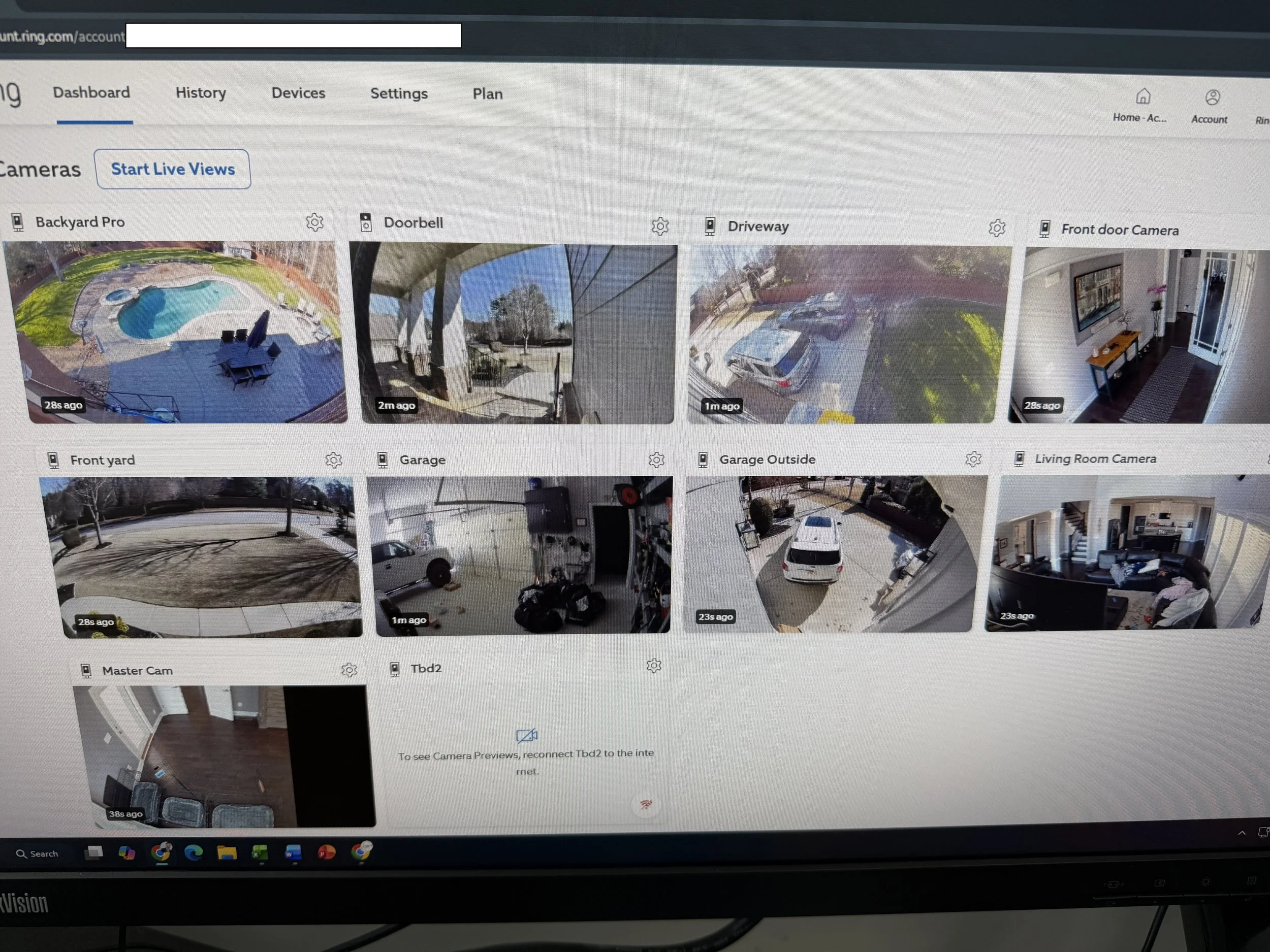 Security camera footage display showing multiple cameras view of a backyard pool, driveway, front yard, garage, living room, and entryway inside a house.