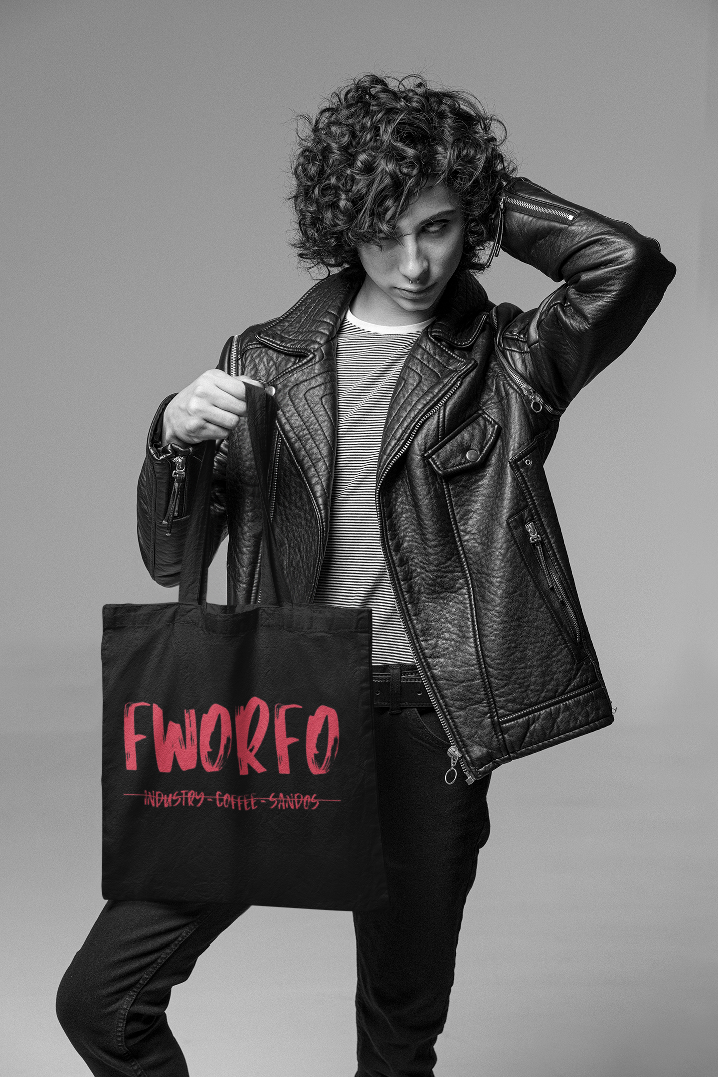 tote-bag-mockup-of-a-stylish-man-posing-at-a-studio-m26387.png