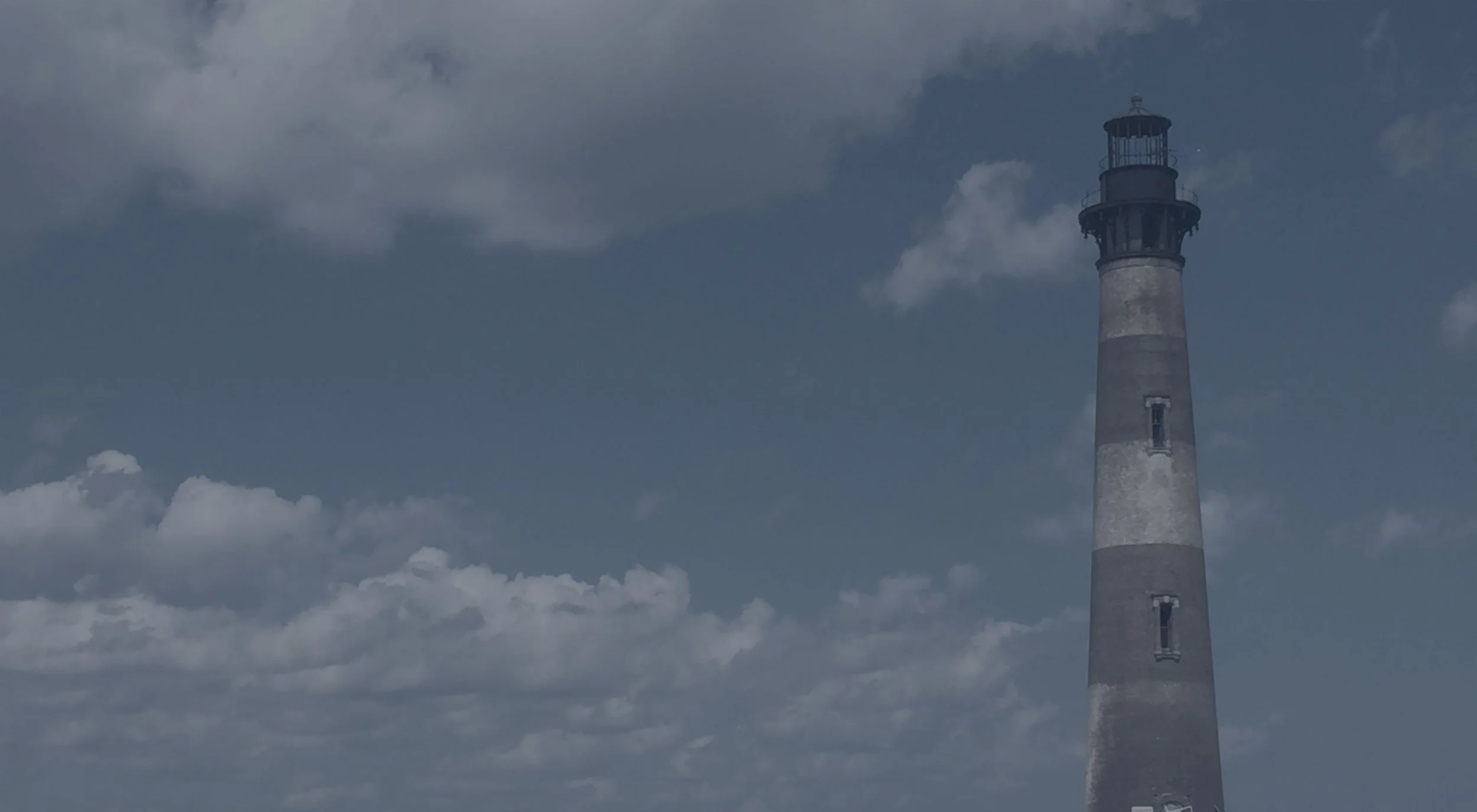 classic lighthouse with a blue sky