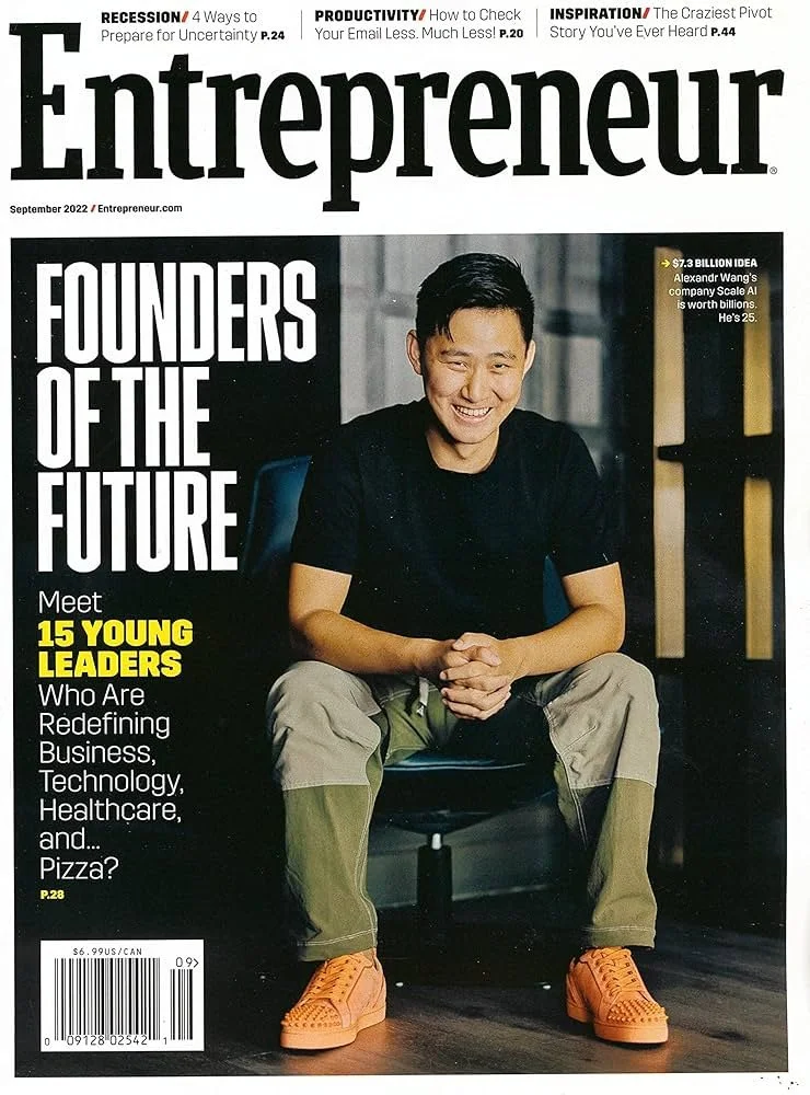Cover of Entrepreneur magazine, September 2022 issue, featuring a young man sitting on a chair, wearing black T-shirt, cargo pants, and orange sneakers, smiling. The headline reads "Founders of the Future," highlighting 15 young leaders reshaping var