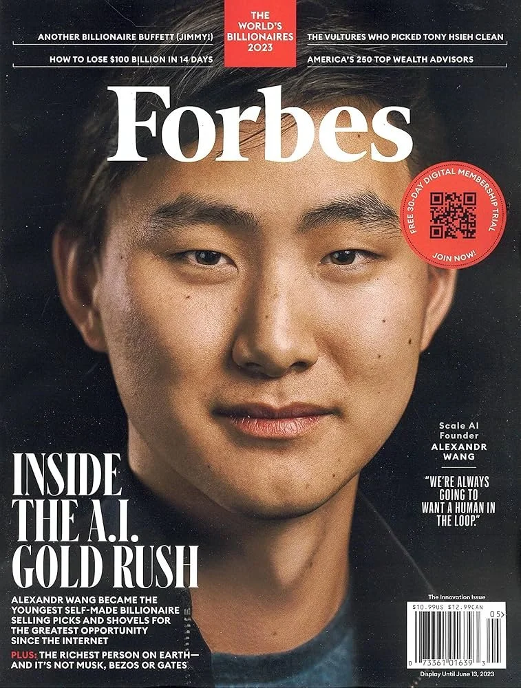 Cover of Forbes magazine featuring a close-up of Scale AI founder and CEO Alexandr Wang's face, with headlines about wealth, AI, and billionaires, and a red QR code sticker on the top right.