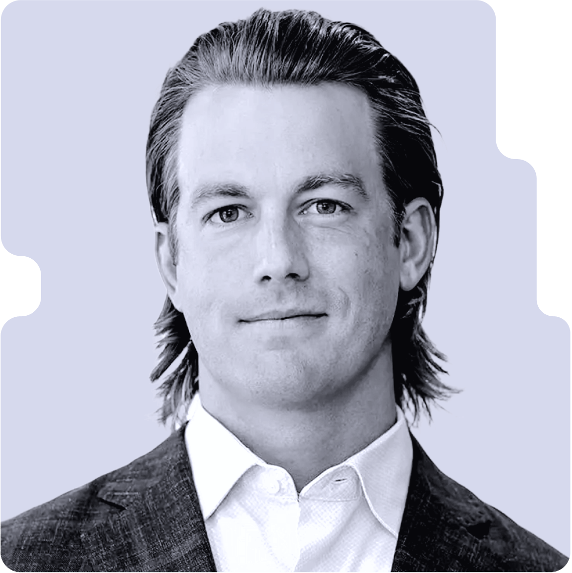 Duncan Payne, Managing Partner and Chief Growth Officer of Rising Tide Insurance, black and white headshot, medium-length hair, wearing a white shirt and dark blazer, facing forward with a slight smile.