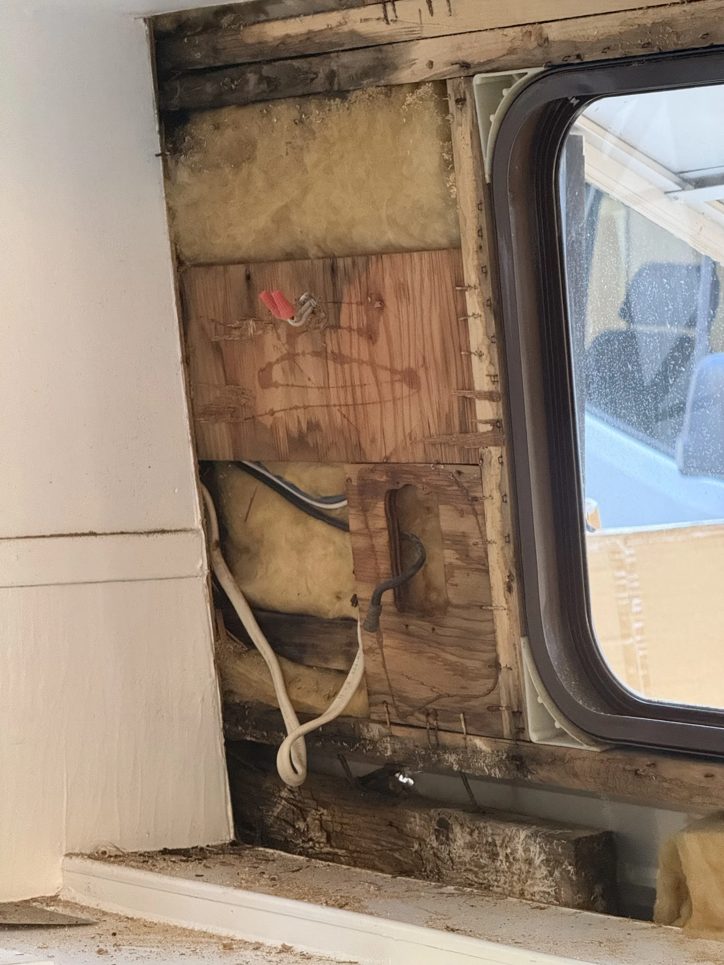 Close up rot repair in camper trailer