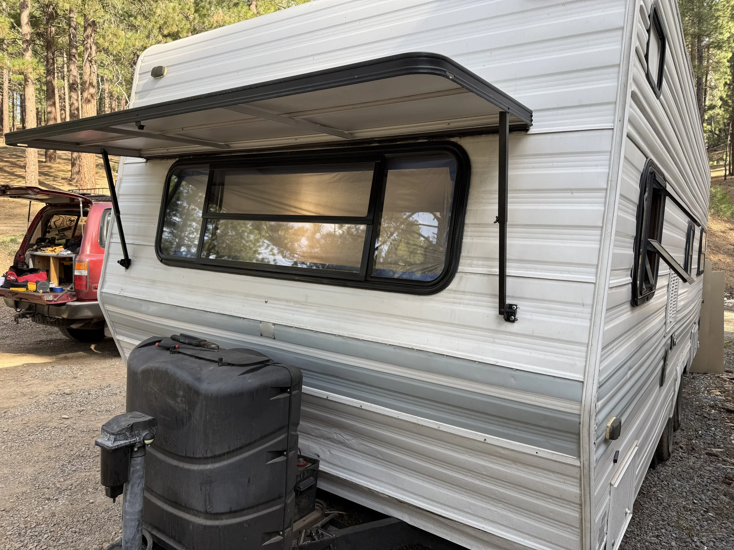 External camper repair and reseal on old camper trailer