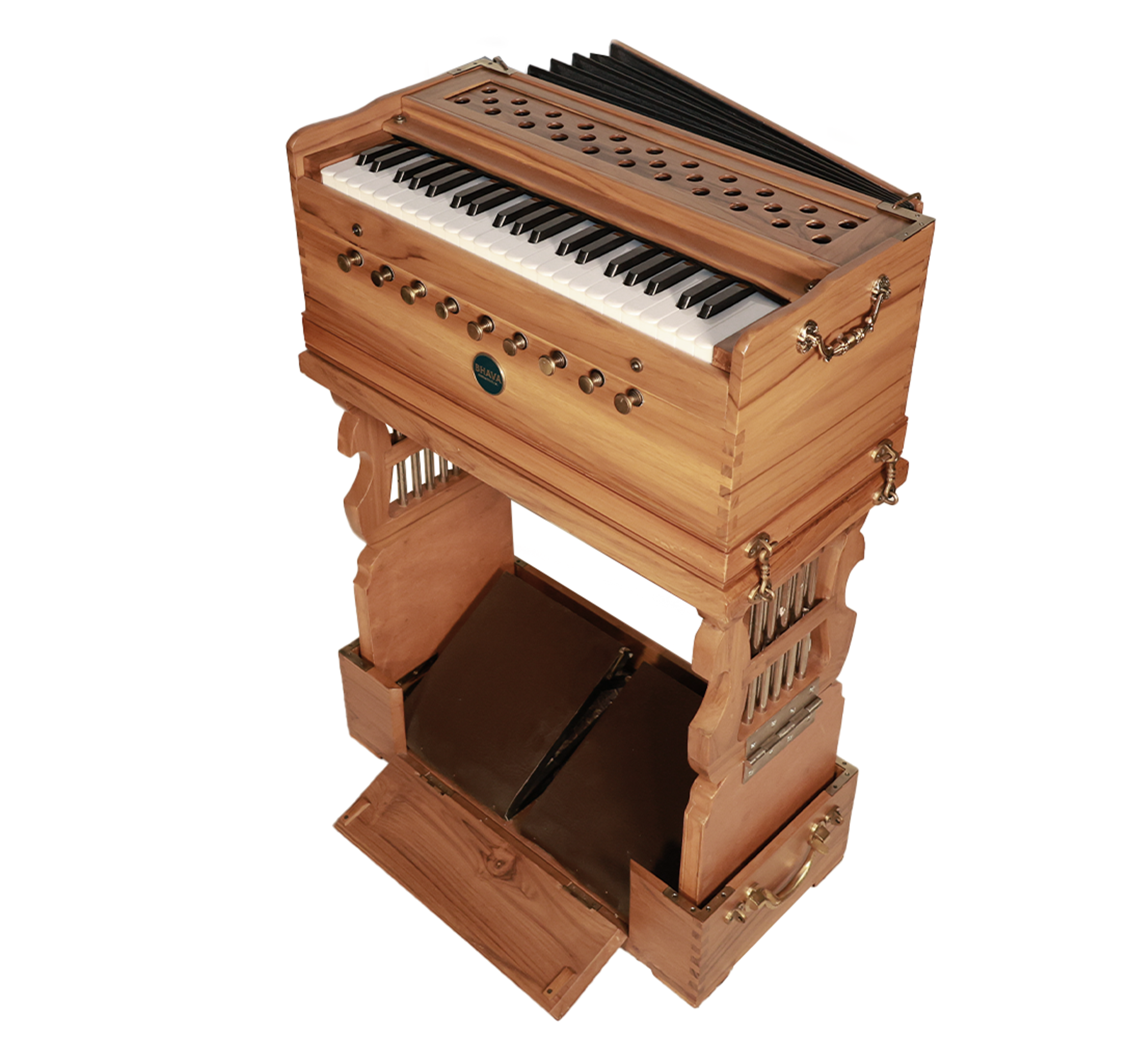 A wooden harmonium with a keyboard, metal handles, and foot pedals, featuring a foldable lid and decorative details.