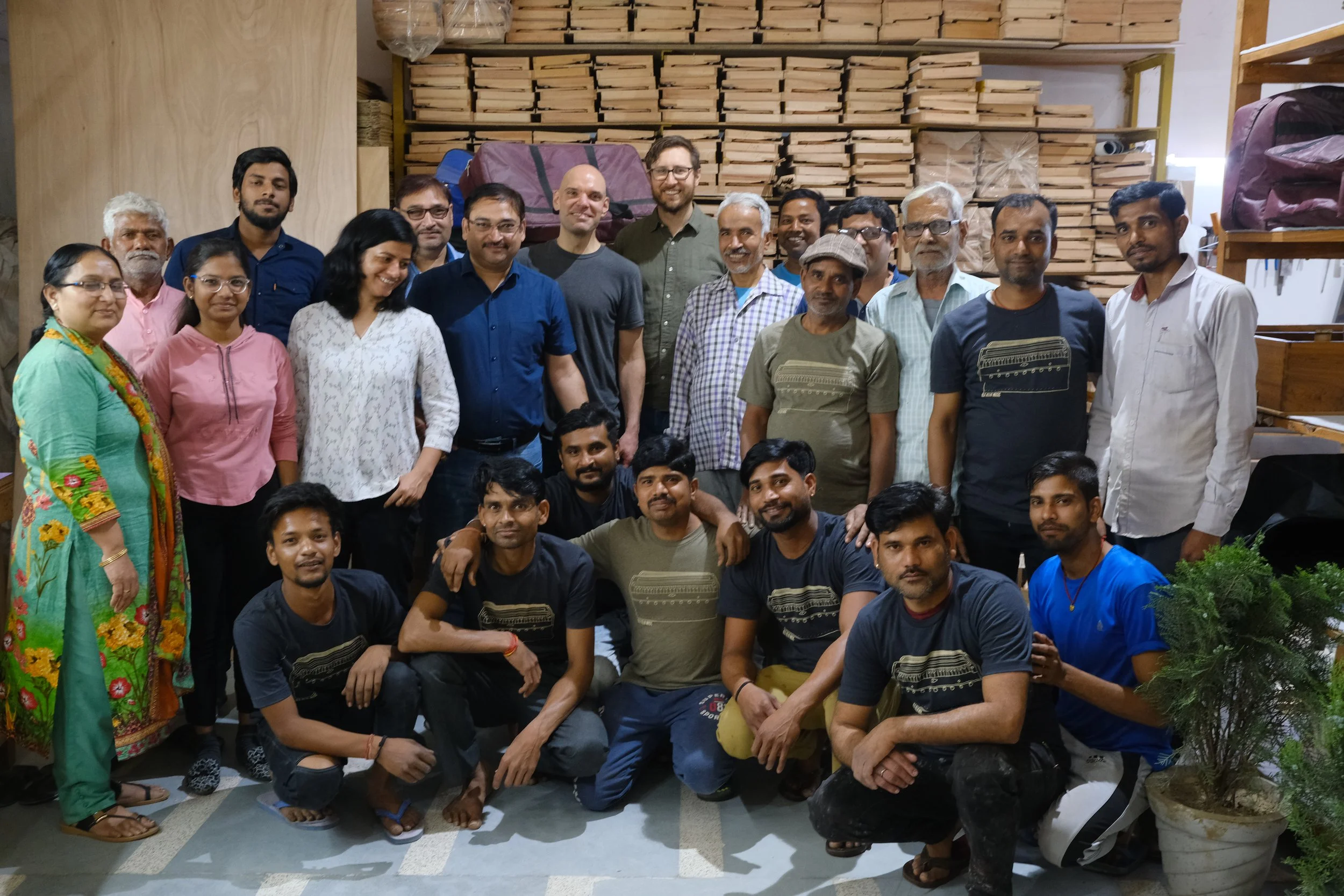 Group photo of India team who build pedal harmonium's