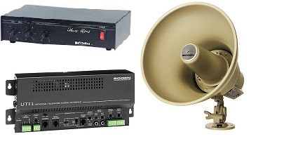 Three electronic devices: a black rectangular audio amplifier, a gray power control unit, and a beige megaphone speaker.