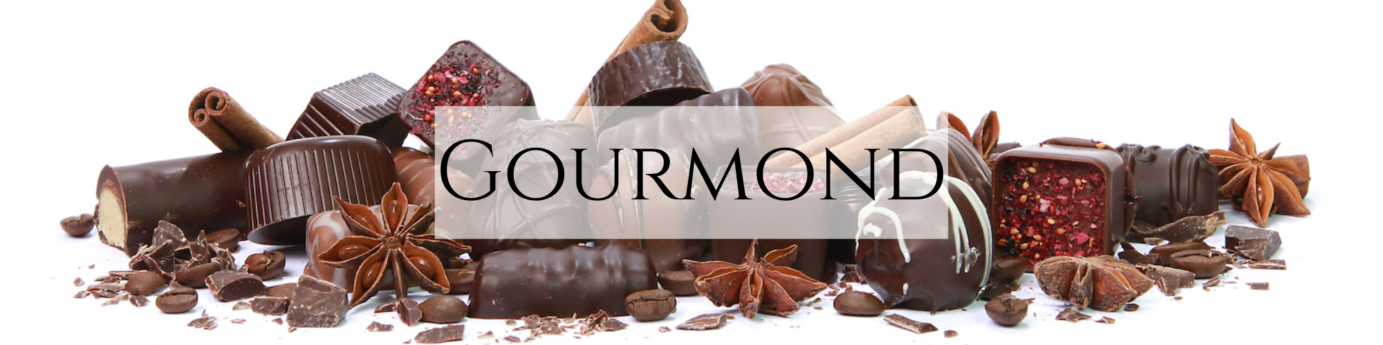 assortment of various chocolates, candies, and spices on a white background with the text "GOURMAND" overlaid