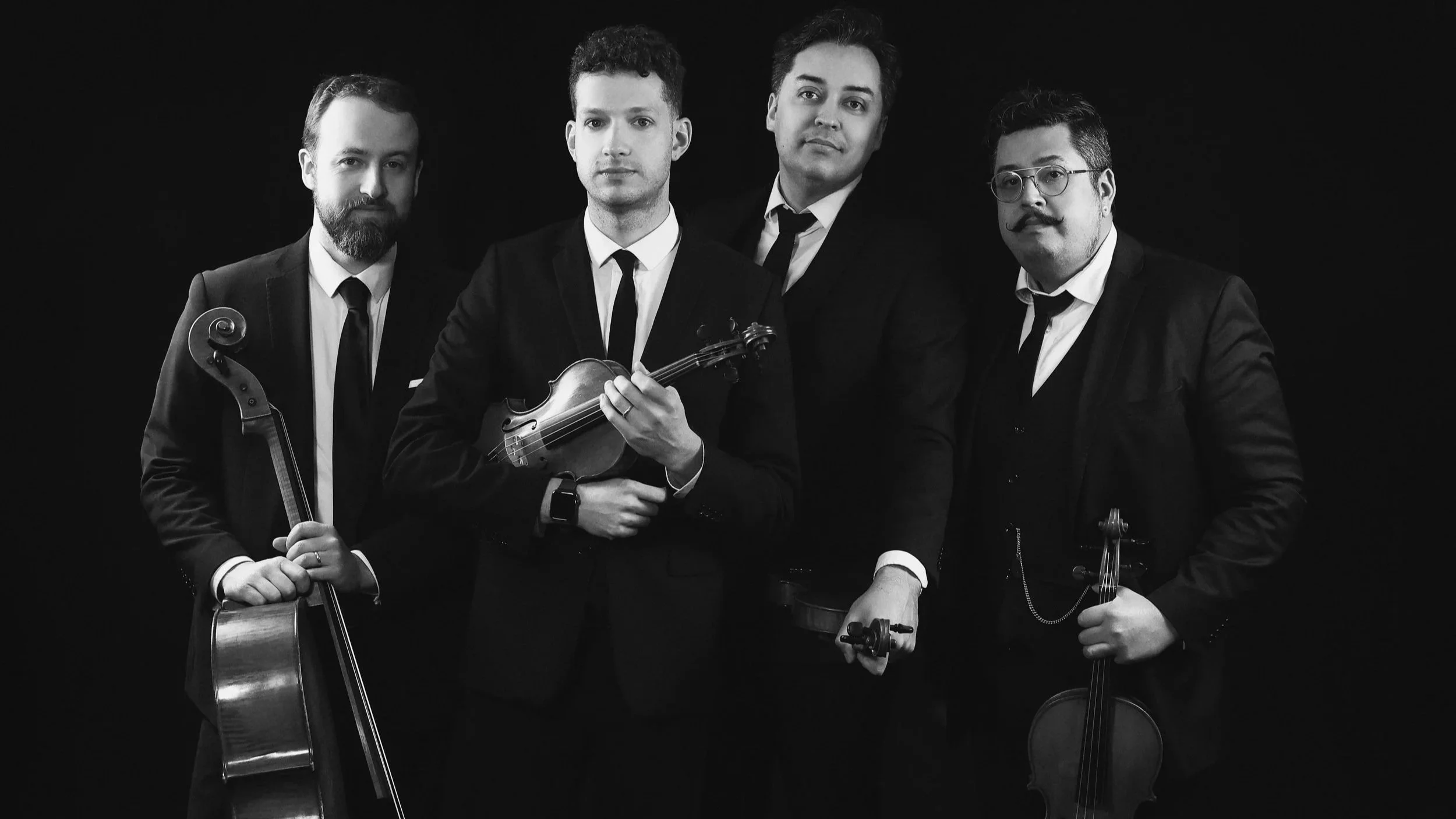 Beo formal group photo in black suites