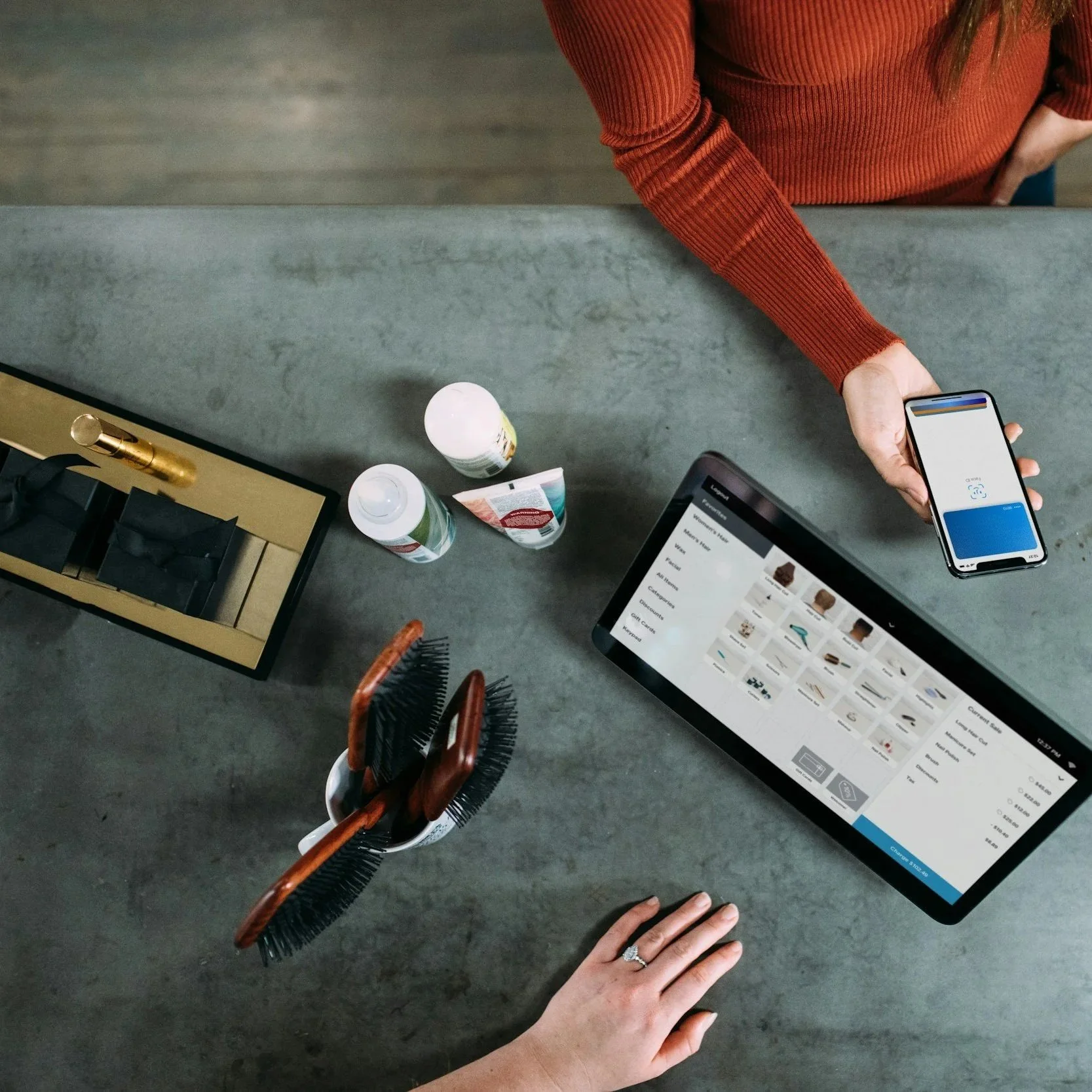 Overhead view of someone completing a purchase using a digital marketing platform.