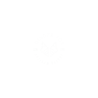 Logo for Ginger Fox Artisan Bakery featuring a stylized fox and bakery text.