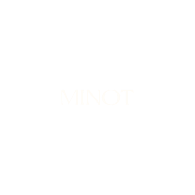 Minot logo with a black crown symbol and the word 'MINOT' in white text