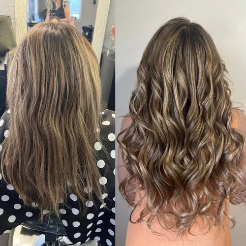 Side-by-side comparison of a woman's hair before and after a styling transformation. The before shows long, slightly wavy hair with a dull color, and the after shows long, voluminous, styled hair with loose curls and highlighted tones.