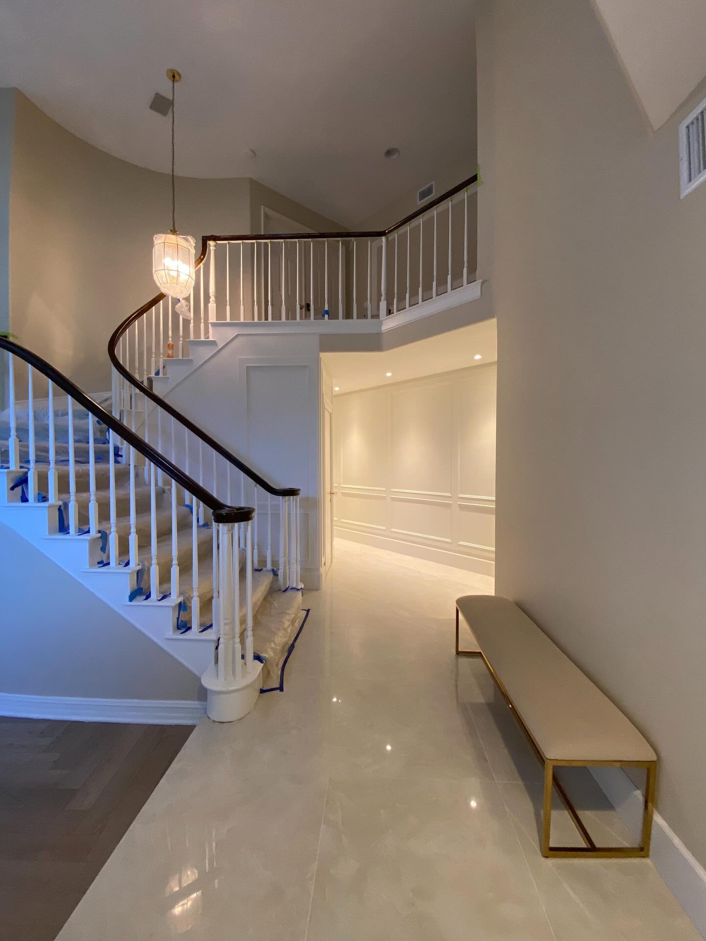 Transformations begin with vision&mdash;and the expertise to execute it flawlessly. Adding a powder room beneath the staircase required extending walls, a change that could have made the hallway and entryway of this home feel smaller. Instead, we saw