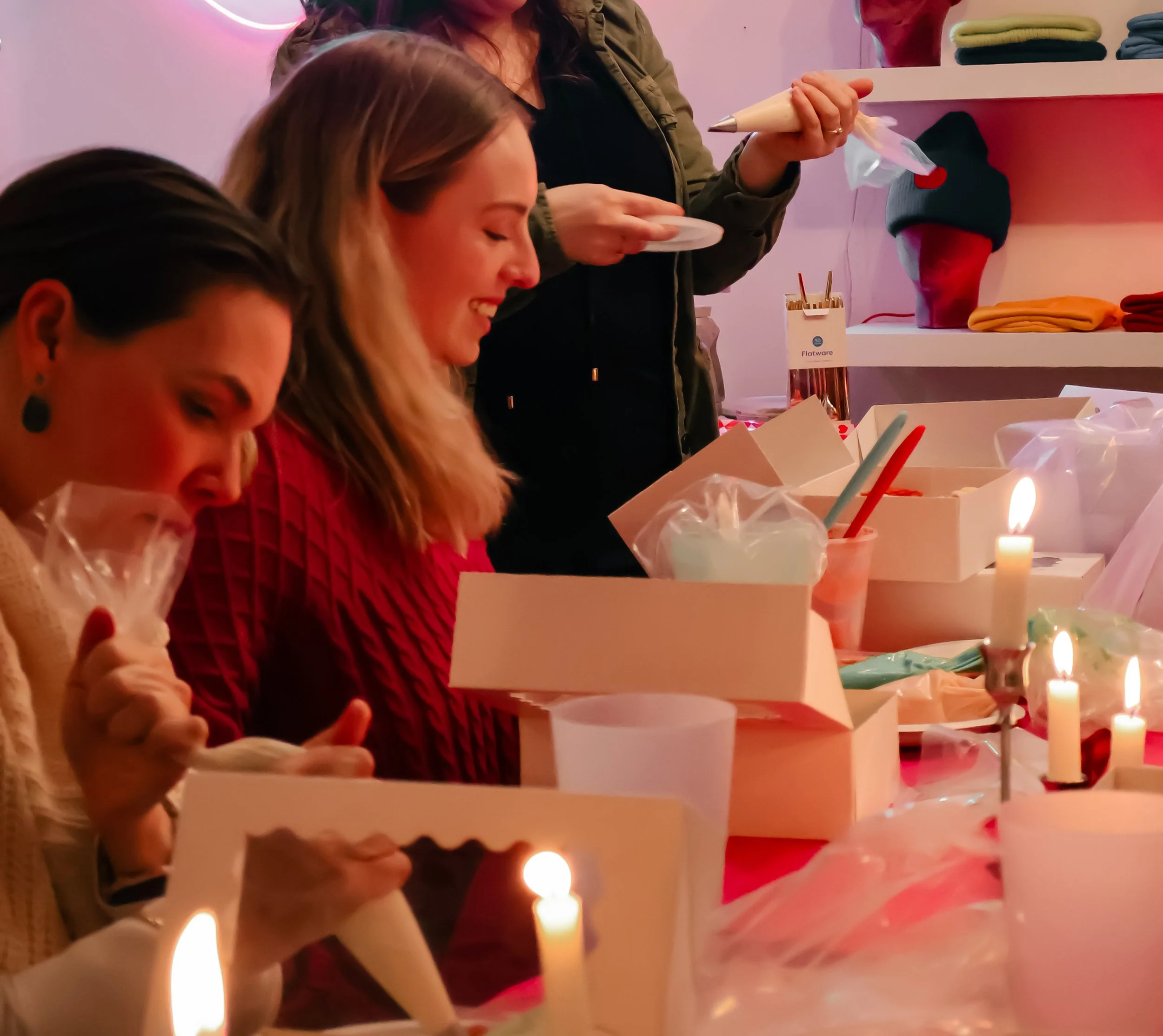 Friends laughing during gluten-free decorating class