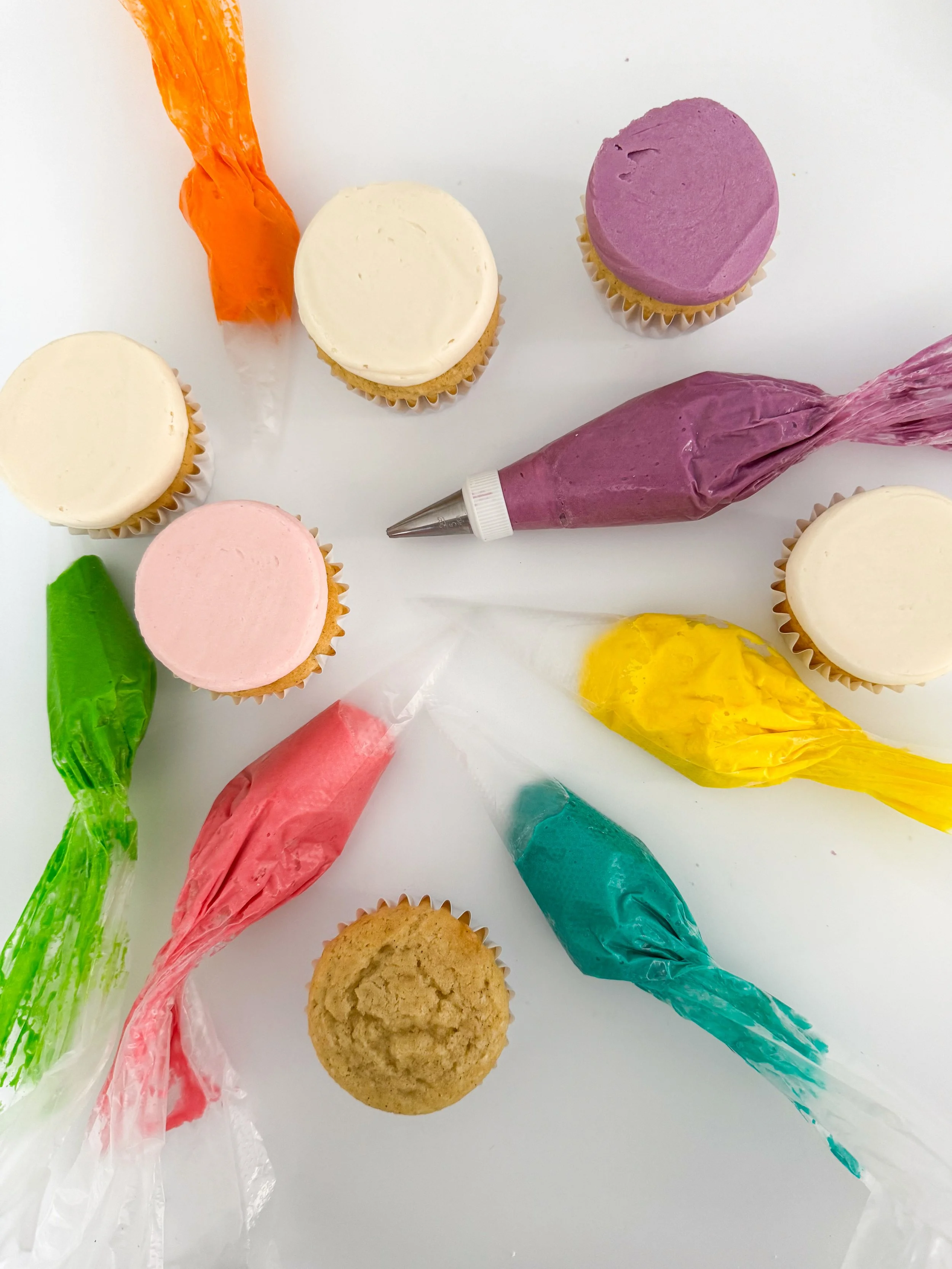 Colorful bright 90's theme gf df cupcakes and icing