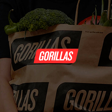 Green broccoli and other vegetables in a paper bag labeled 'Gorillas'