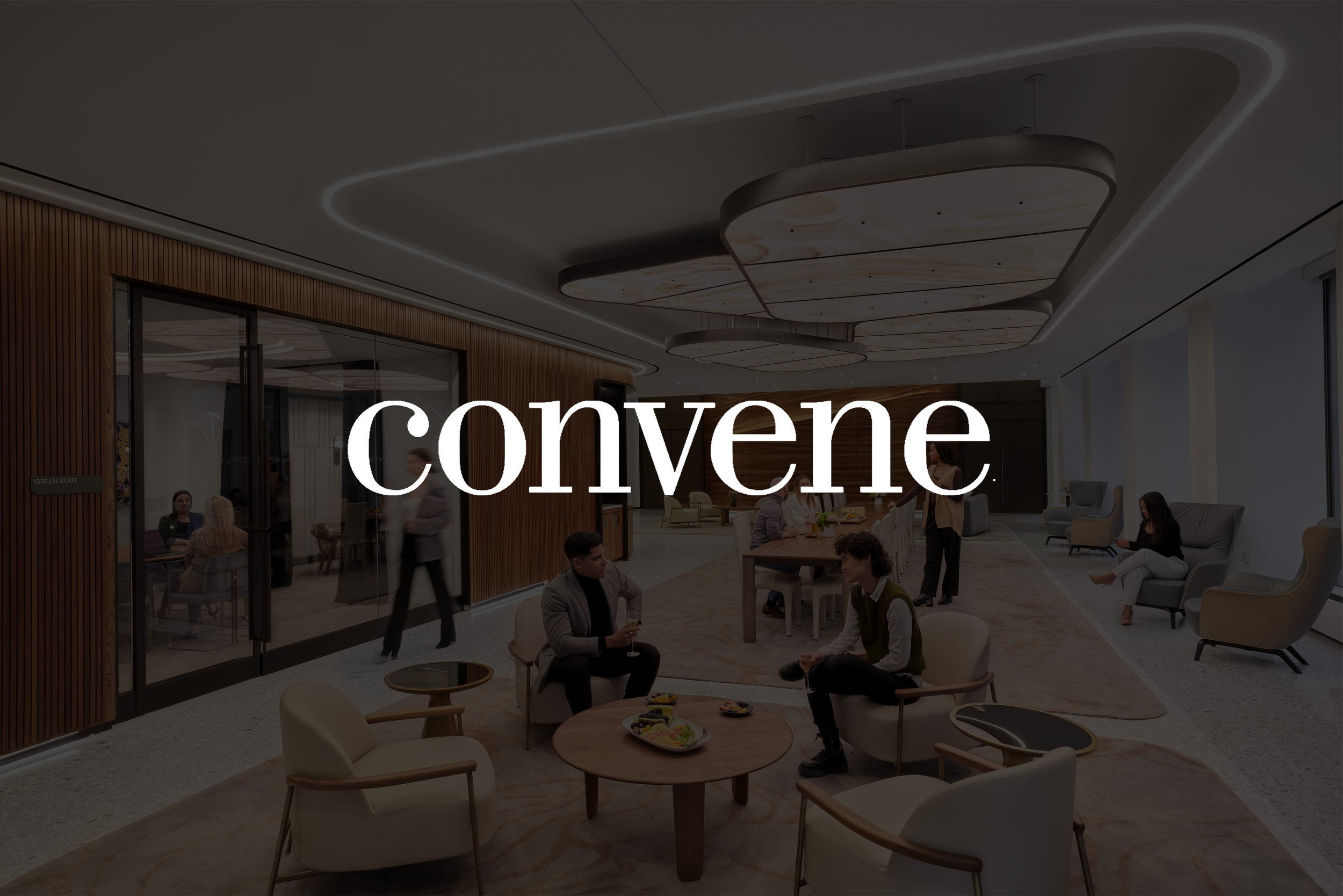 Interior view of Convene office with people sitting and working. 