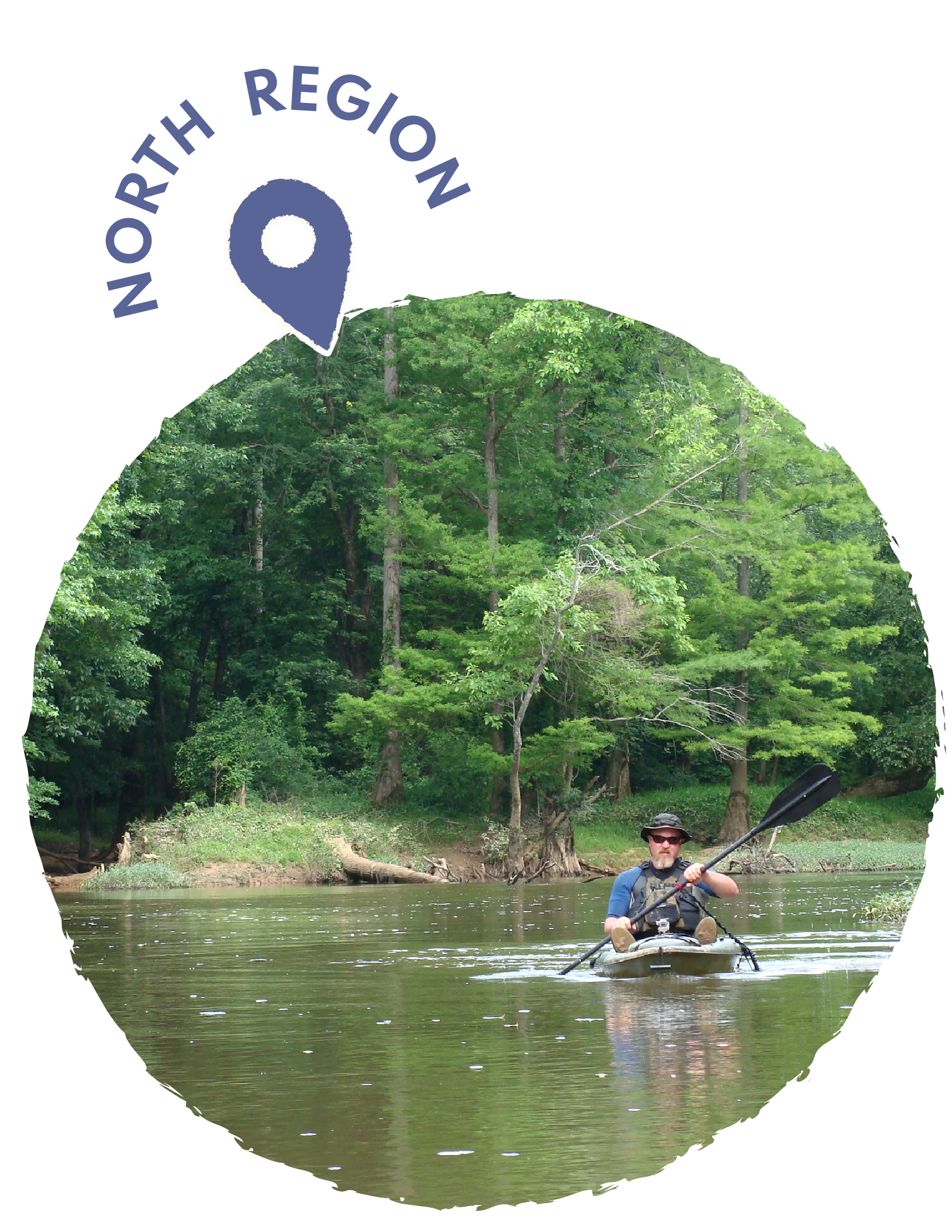 Person kayaking on a river with green trees in the background.