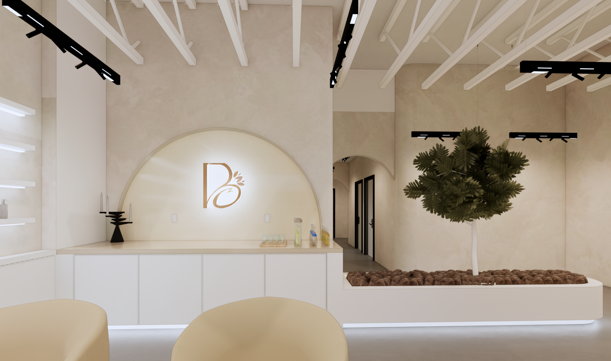 Modern interior space with white walls and ceiling, black track lighting, a decorative tree in a planter, and a white curved reception desk with a gold logo. The logo features a stylized letter 'B' with a small leaf element.