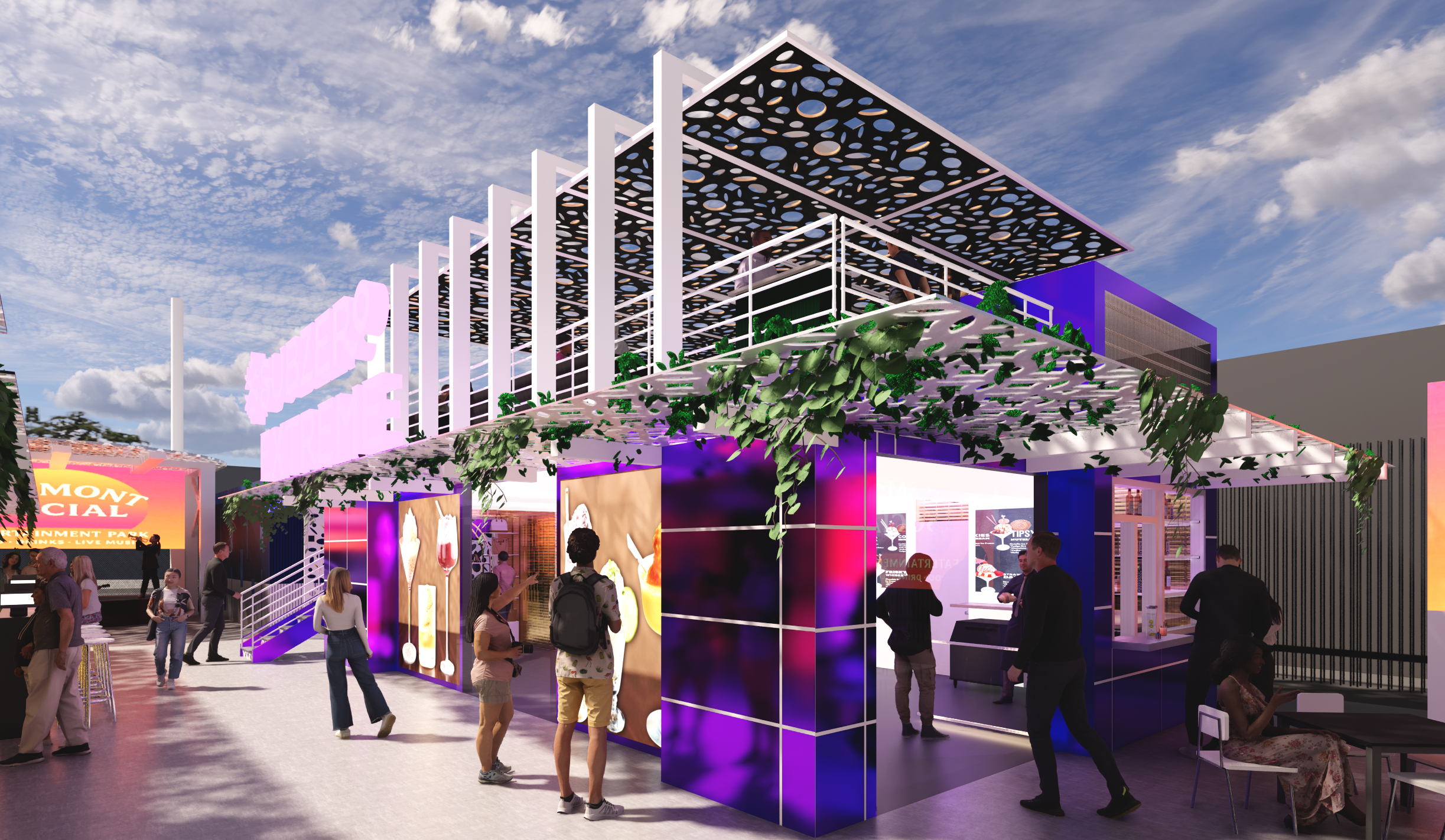 An outdoor event space with modern, colorful booths and a floating canopy decorated with greenery. People are walking and interacting under a partially shaded area, with an evening sky overhead.