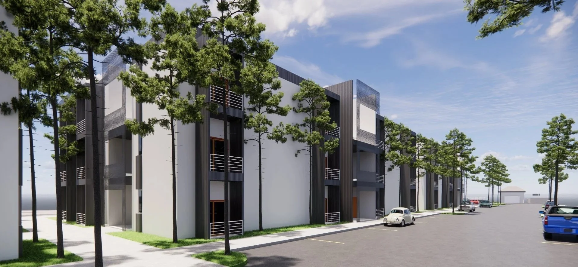 Modern residential building with black and white exterior, surrounded by green trees, parking lot with several cars, and a blue sky with some clouds.