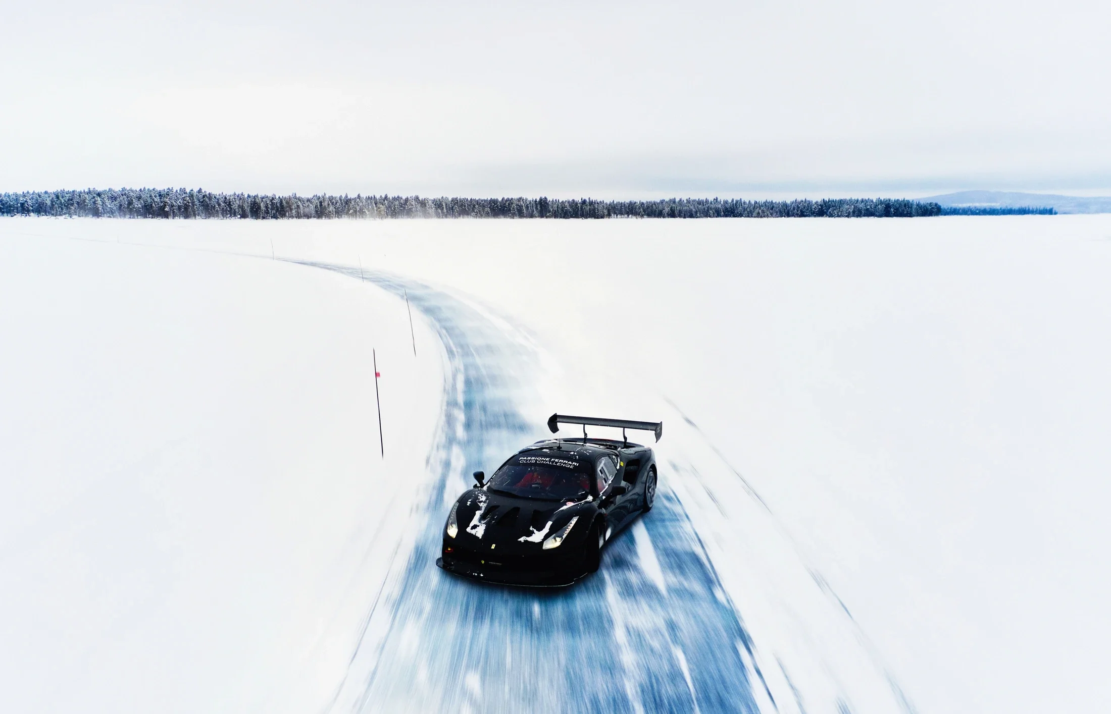 photographe automobile bourg en bresse – voiture Ferrari 488 challenge circuit glace neige Laponie Lapland Ice Driving glisse drone