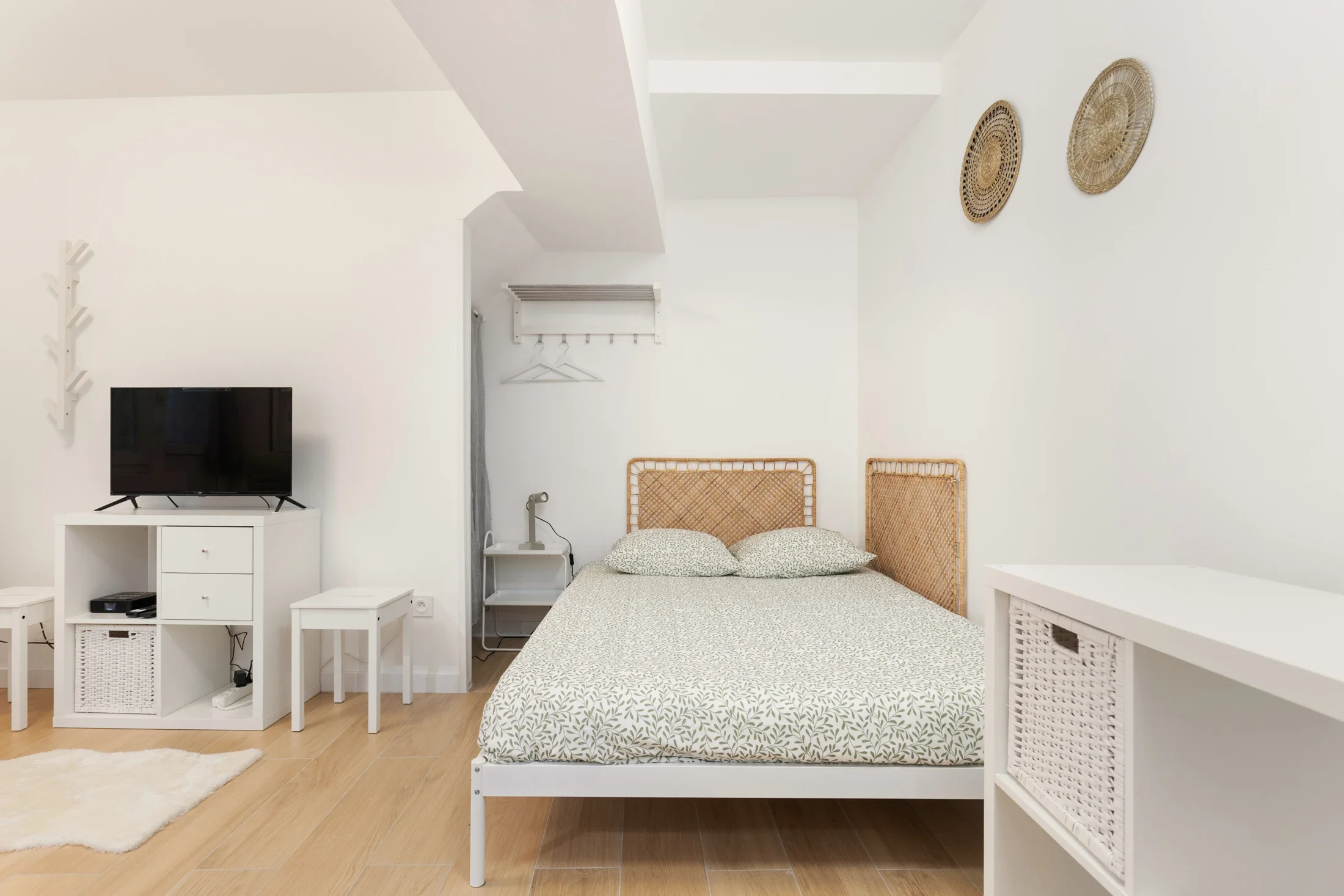 photographe immobilier bourg en bresse – Chambre d'un studio locatif à bourg en bresse géré par La Conciergerie Bressane