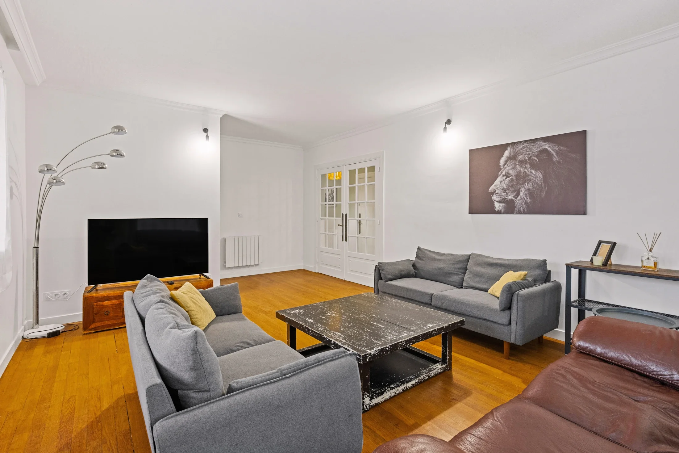 photographe immobilier bourg en bresse –  salon d'un logement locatif à bourg en bresse géré par La Conciergerie Bressane