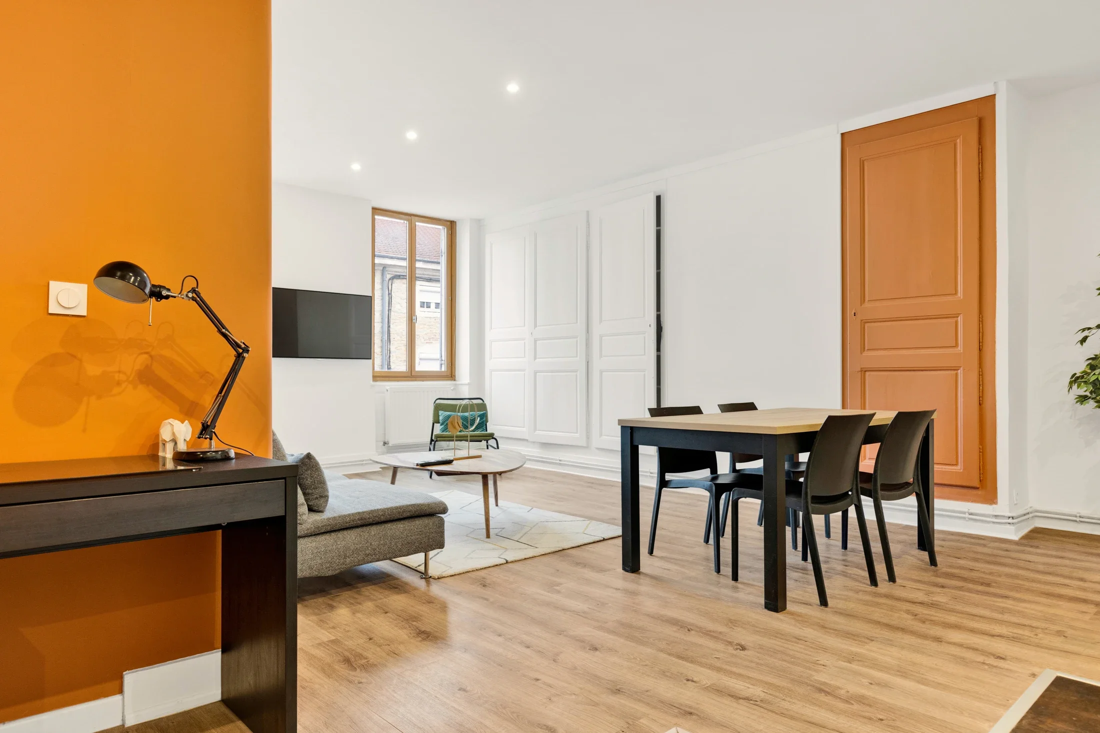 photographe immobilier bourg en bresse – Salon d'un appartement locatif à bourg en bresse géré par La Conciergerie Bressane