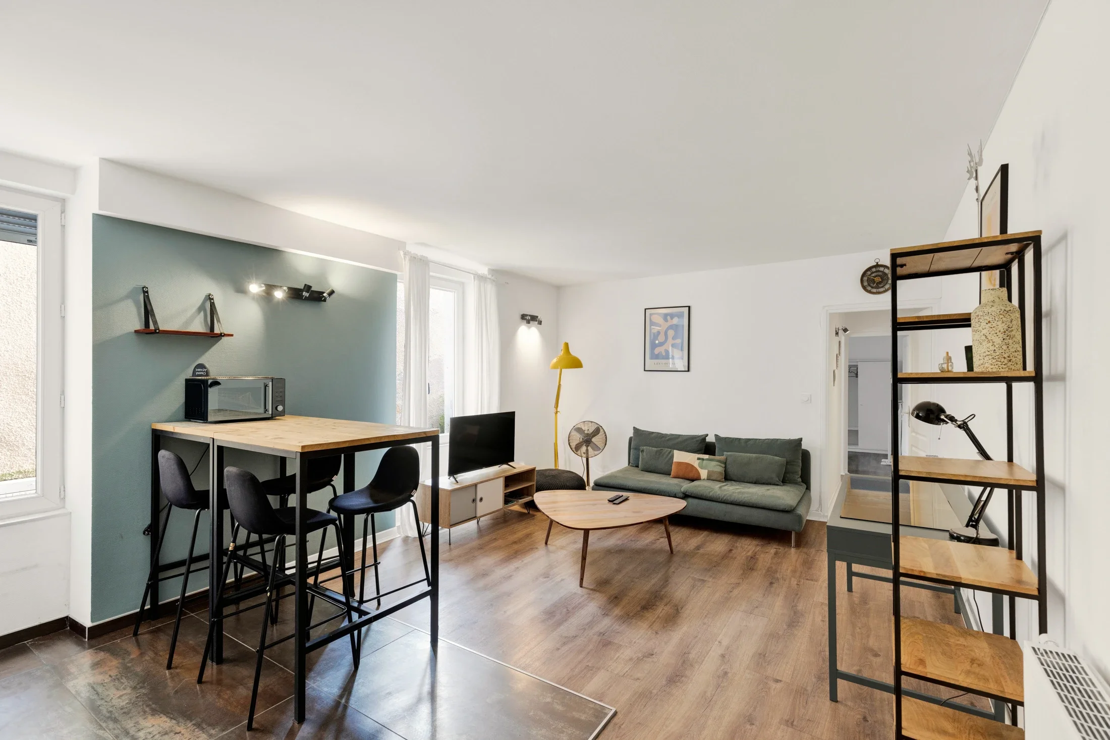 photographe immobilier bourg en bresse – Salon d'un appartement locatif à bourg en bresse géré par La Conciergerie Bressane