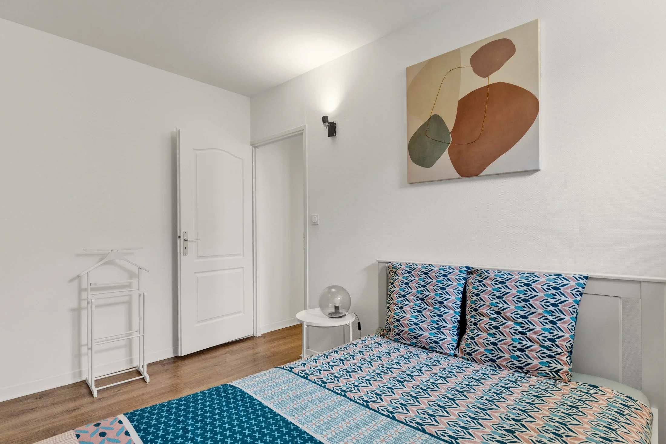 photographe immobilier bourg en bresse – Chambre d'un appartement locatif à bourg en bresse géré par La Conciergerie Bressane