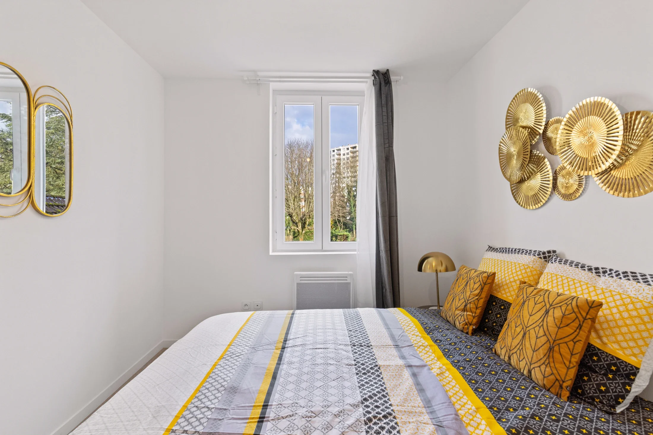 photographe immobilier bourg en bresse – Chambre d'un logement locatif à bourg en bresse géré par La Conciergerie Bressane