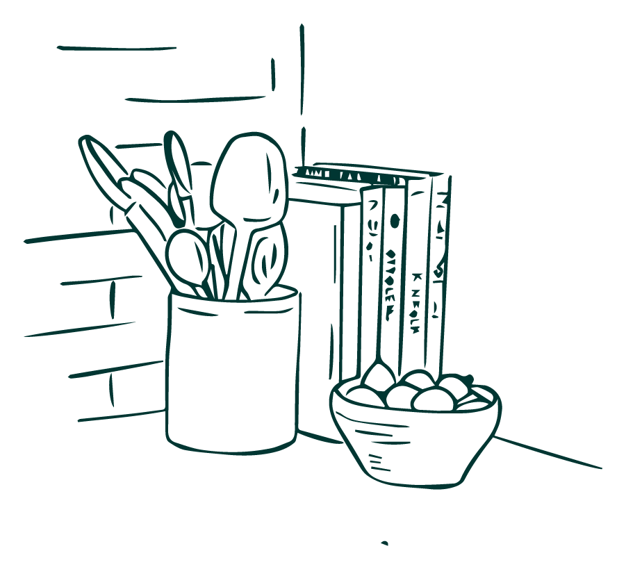 Line drawing of a kitchen countertop with a cup holding utensils, a bowl of fruit, and a row of cookbooks.