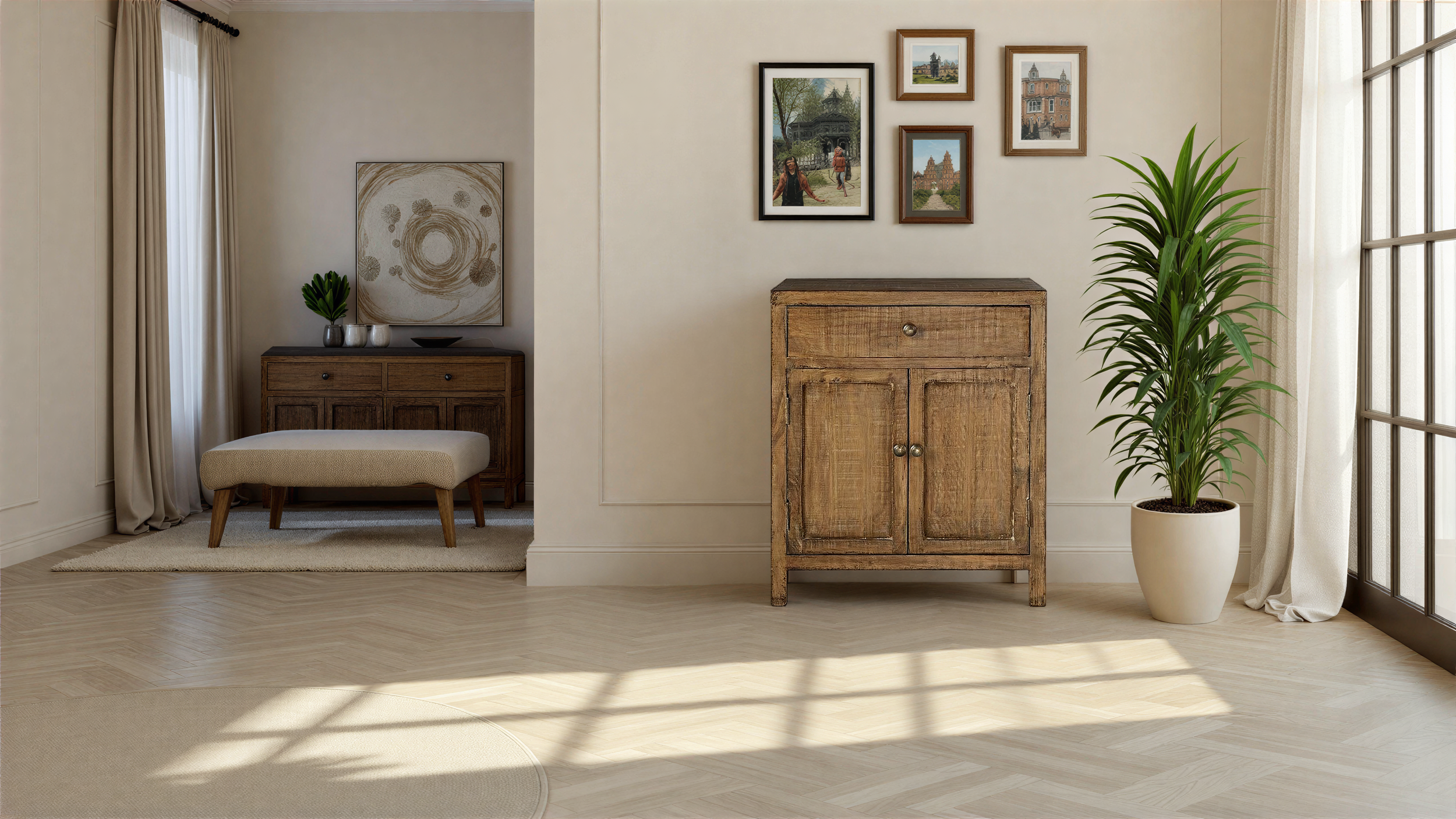 A well-lit living room corner with beige walls, a large window with sheer curtains, a tall potted plant, a wooden cabinet, a small bench, and framed art above the cabinet.