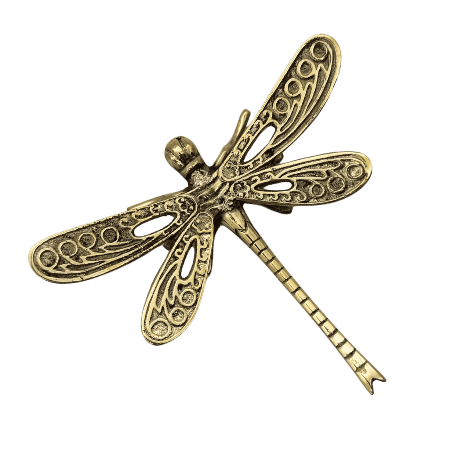 Gold-colored decorative dragonfly brooch with intricate wing patterns on a black background.