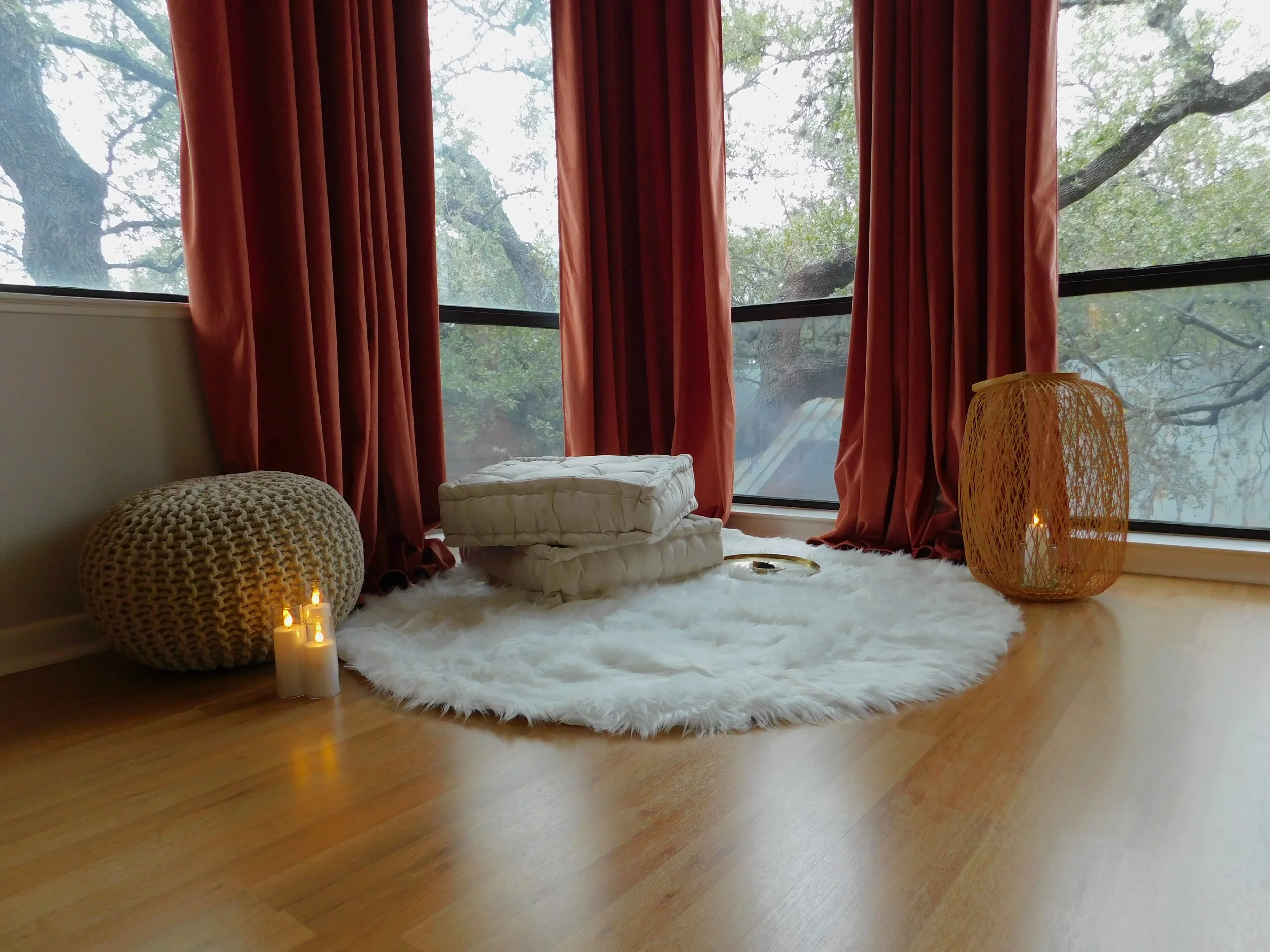 Suite A nature-facing therapy office with meditation corner and tree views, available through flexible membership options.