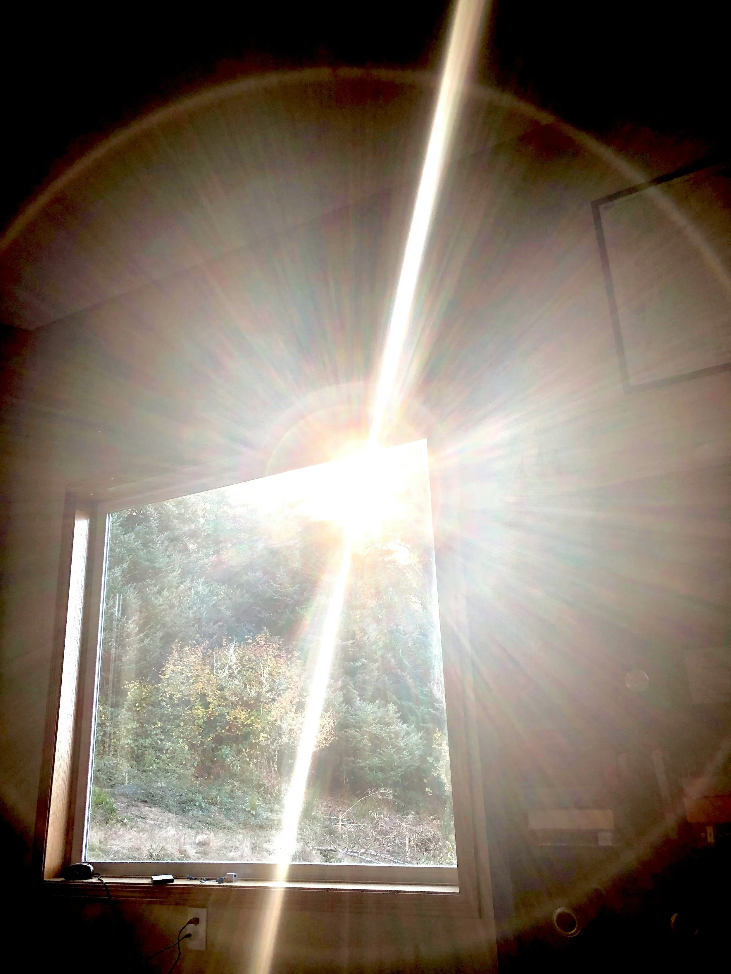 Sunlight streaming through the windows of Suite C, highlighting the bright and airy balcony therapy suite.
