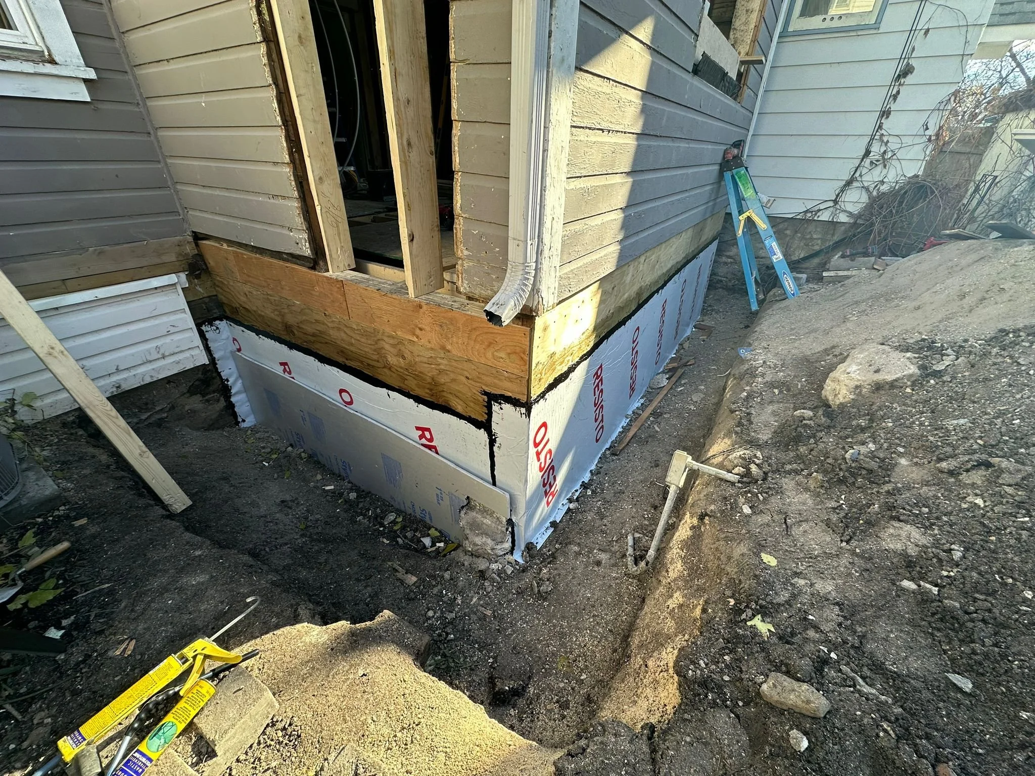 House wrap starts to go on