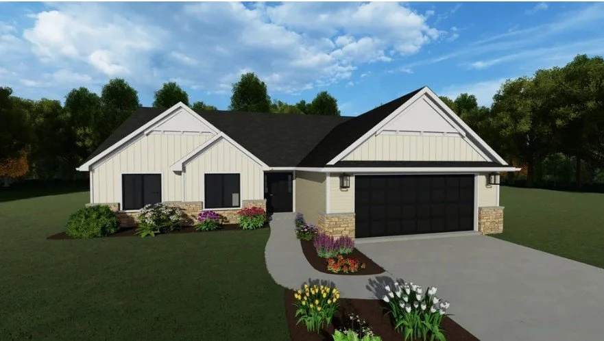 A modern single-story house with white siding and a black roof, featuring a two-car garage, surrounded by green lawn, trees, and flower beds under a blue sky with scattered clouds.