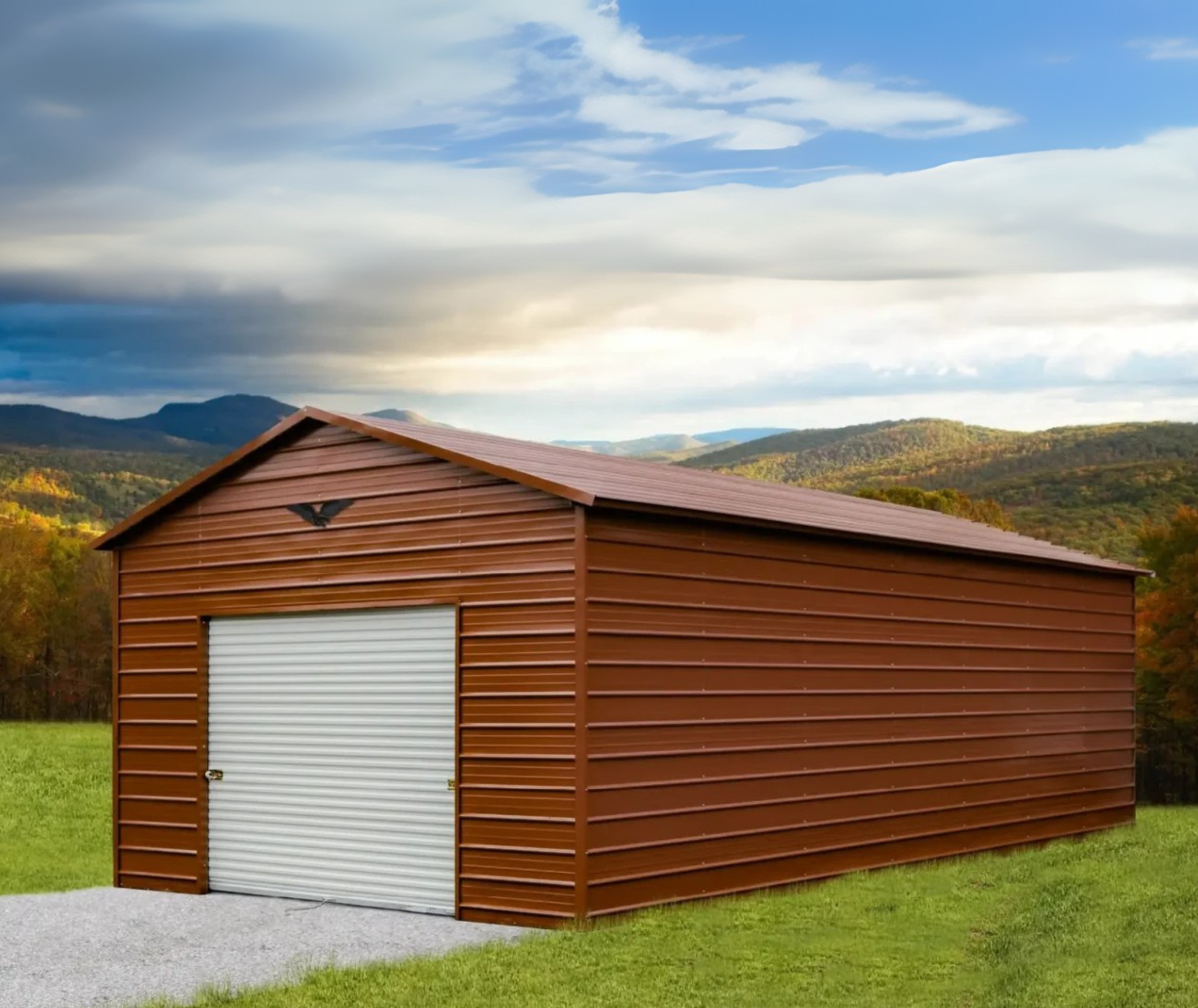 A brown metal garage with a white roll-up door, a black bird decal on the front, and a mountain landscape and cloudy sky in the background.