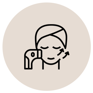 Line drawing of a woman rinsing her face with water from a faucet.