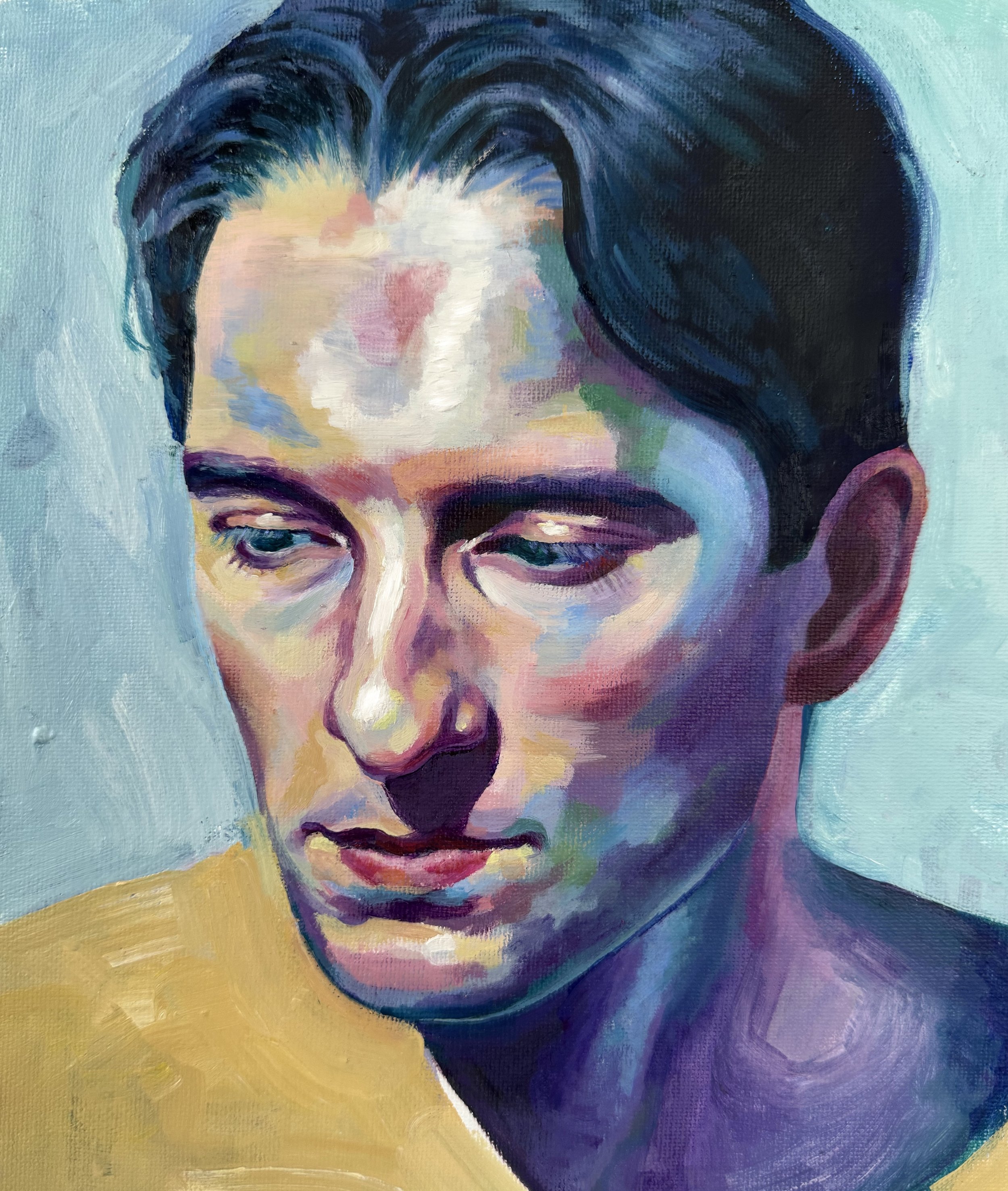 A colorful abstract portrait painting of a young man with dark hair, blue eyes, and a contemplative expression, set against a light background.