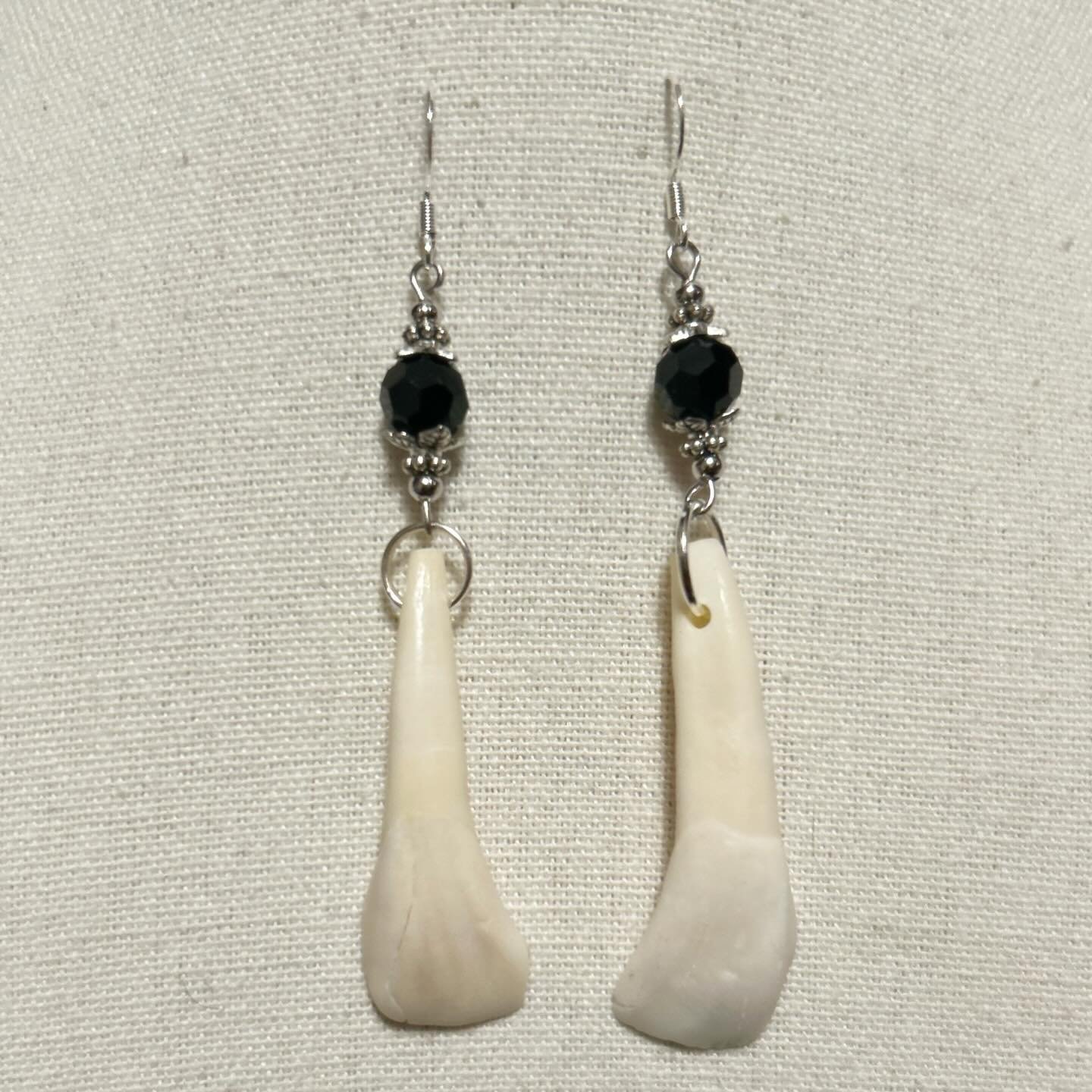 American bison teeth with black antique beads and silver findings.
