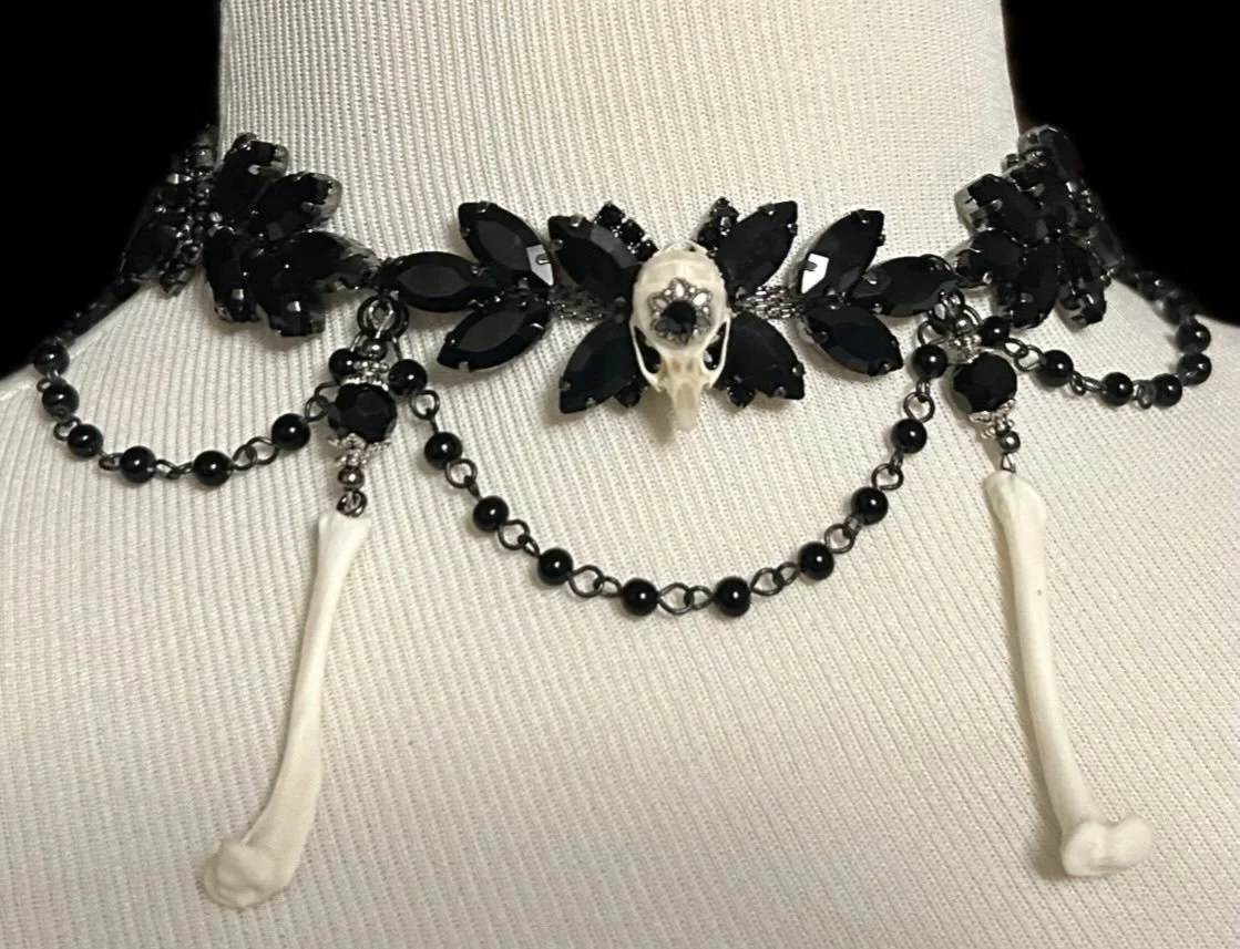 I majorly fell in love with this rhinestone-chain-ribbon situation. It&rsquo;s so pretty! Gotta love sparkle! 

I combined it with mink bones and a mouse skull with upcycled beaded chain.