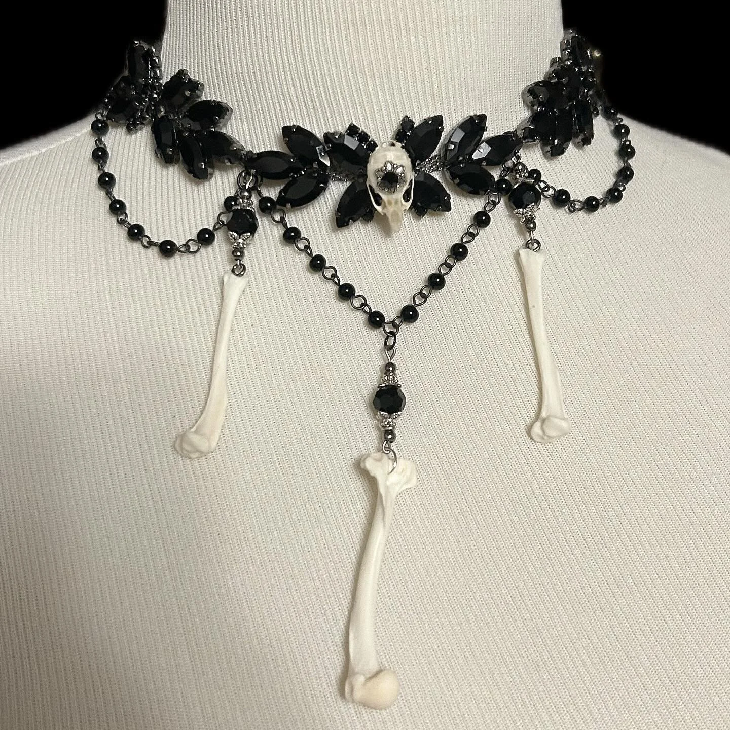 I have had this necklace on my dress form ever since I posted it. I decided it needed the additional bone. I usually like to do things in sets of 3 so this was much more pleasing to my calm!