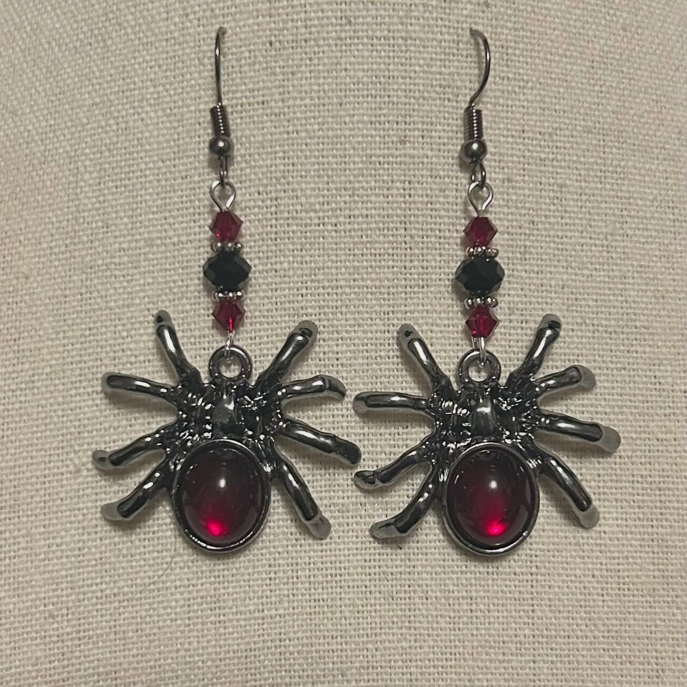 Spider pendants with upcycled black and red glass beads.