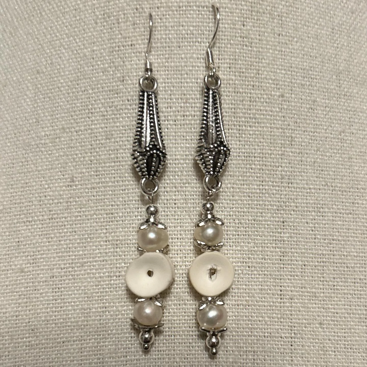 Shark vertebrae with fresh water pearls.