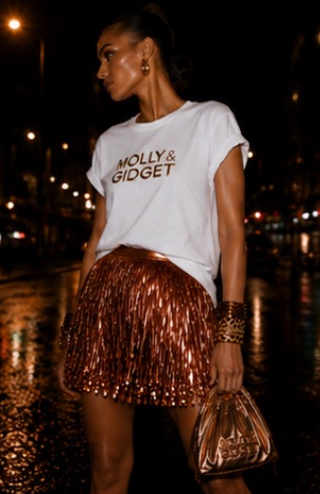 SAWYER BRONZE FRINGE SKIRT
SIZING: Waist 24"; Hips 32"
PRICE: $750*