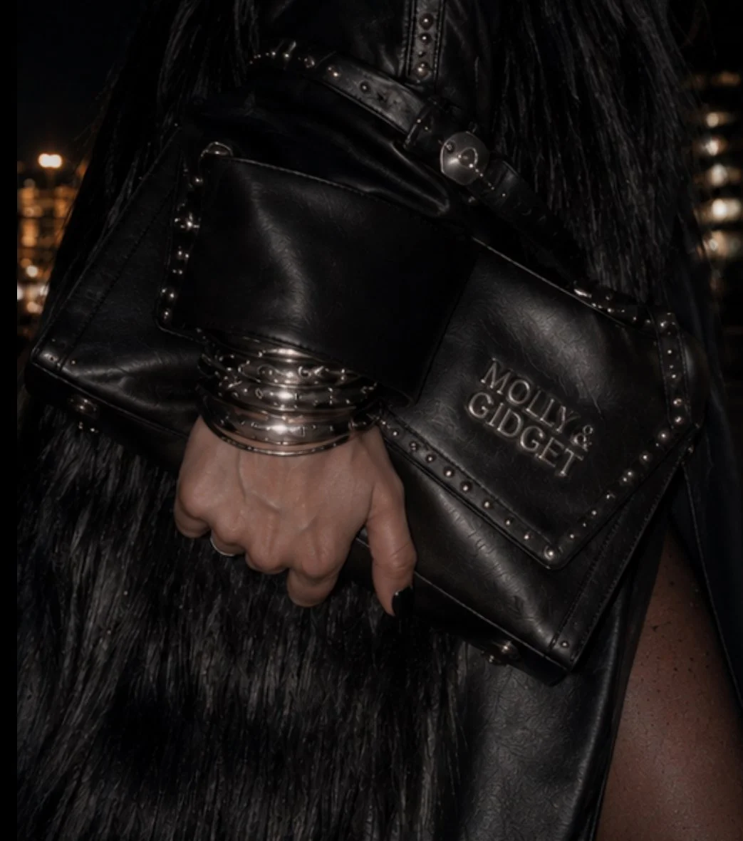 TK LEATHER CLUTCH BAG
PRICE: SOLD